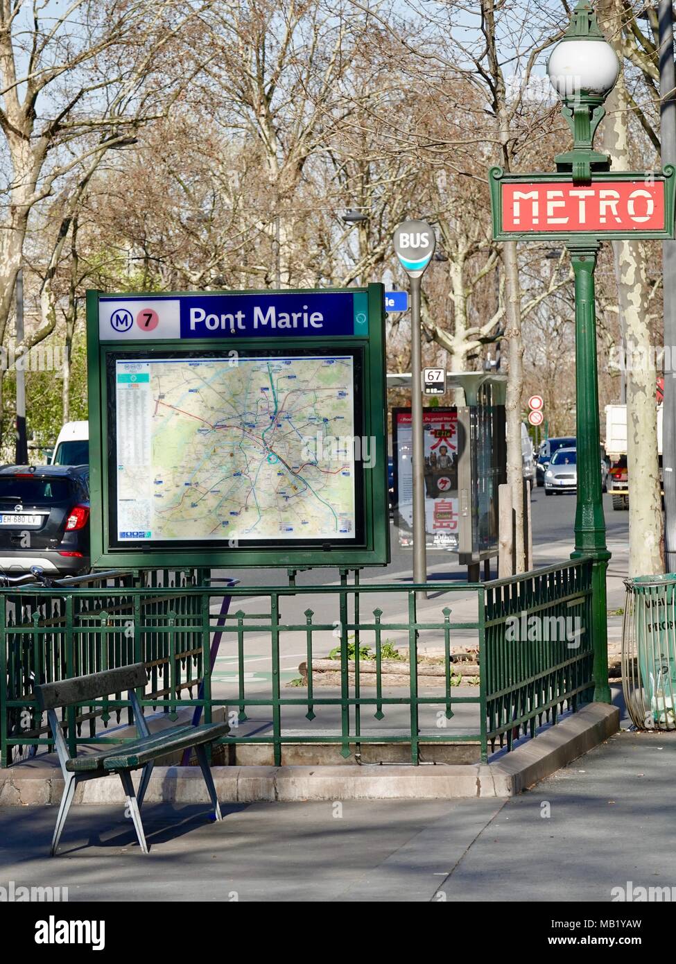 Pont Marie Métro Line 7, entrance with Metro sign and transportation map. Paris, France Stock Photo