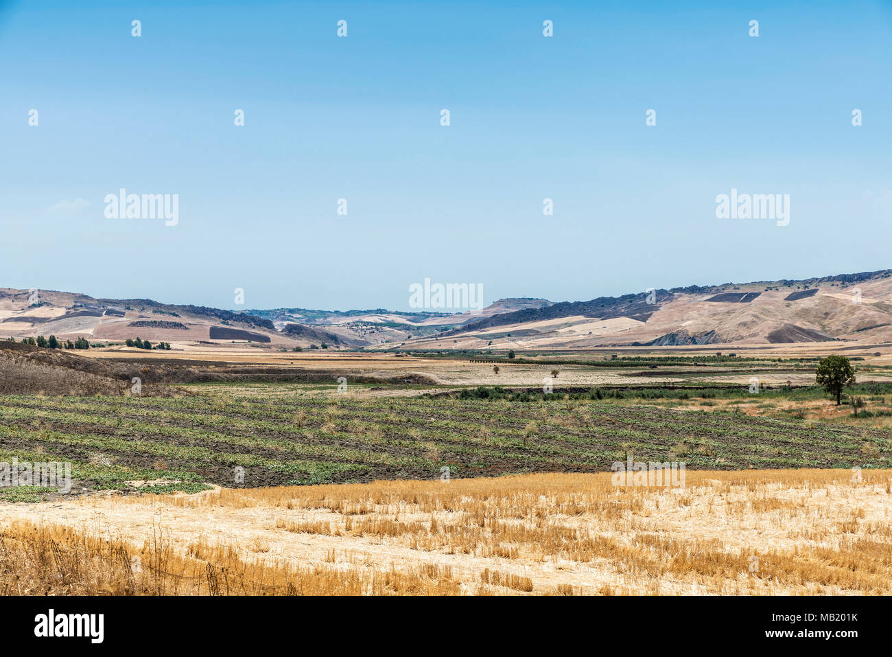 Dry land and wheat fields after harvest in the interior of Sicily ...