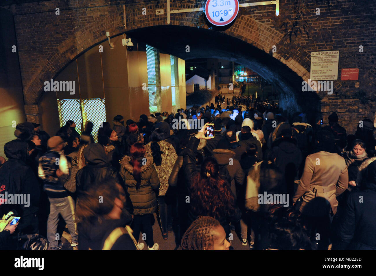 Marchers from the grassroots community organisation, GANG (Guiding A New Generation) arriving at Link Street in Hackney, London, United Kingdom.  The demonstration follows the death on Wednesday (04.04.2018) of 18-year-old Israel Ogunsola who was stabbed to death and died in Link Street, Hackney. Police found him wounded after they were alerted by a motorist just before 8.00pm.   He was given first aid by police officers, but died at the scene at 8.24pm. He was initially thought to be aged in his 20s.  GANG is a youth outreach movement which focusses on the black community and implores young m Stock Photo