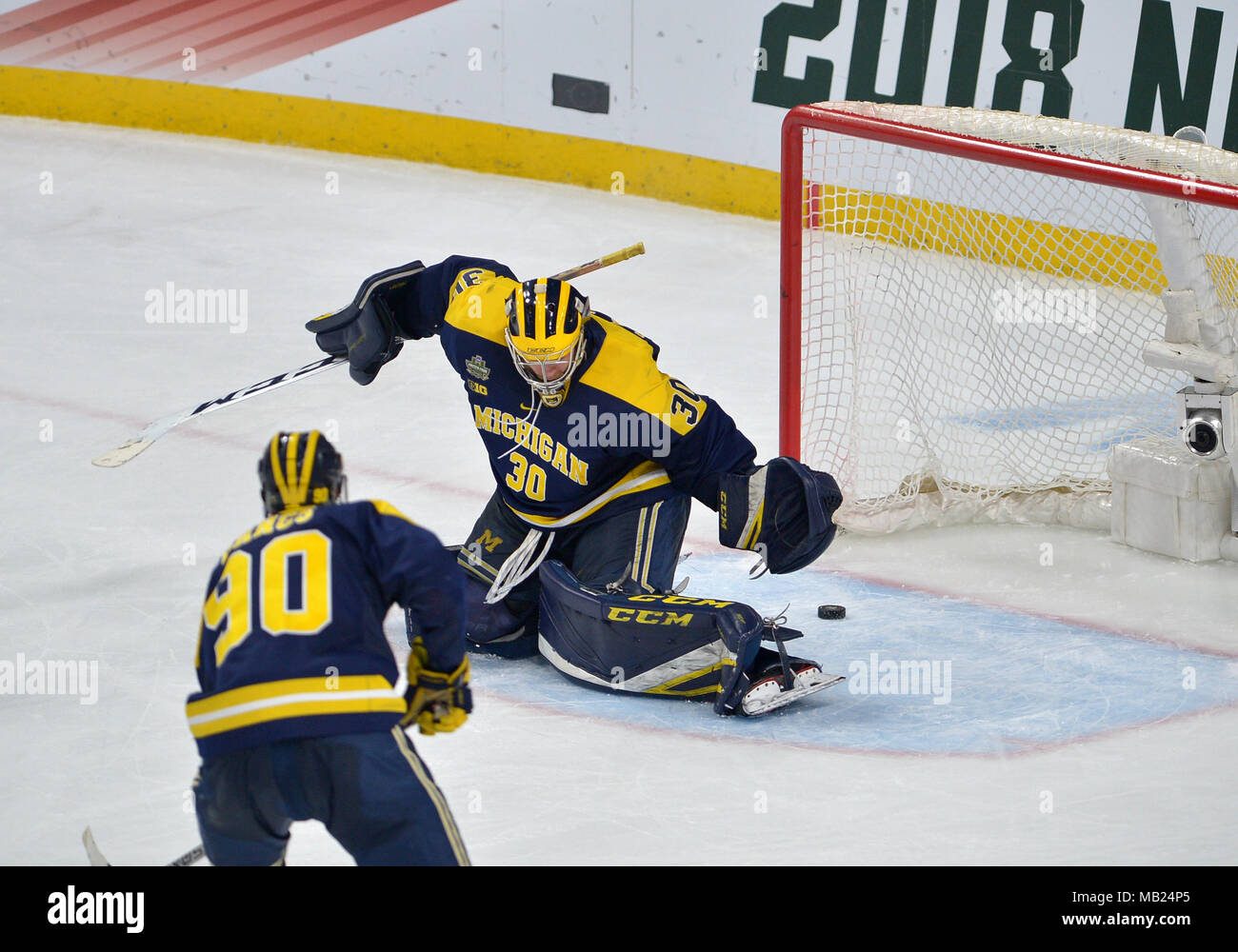 Saint Paul, Minnesota, USA. 05th Apr, 2018. Michigan Wolverines goaltender Hayden Lavigne #30 miss the block on the puck of the final seconds during the Frozen Four semi-finals game between the Michigan Wolverines and the Notre Dame Fighting Irish at Xcel Energry Center in Saint Paul, Minnesota. Notre Dame advances against Michigan, 4-3. Patrick Green/CSM/Alamy Live News Stock Photo