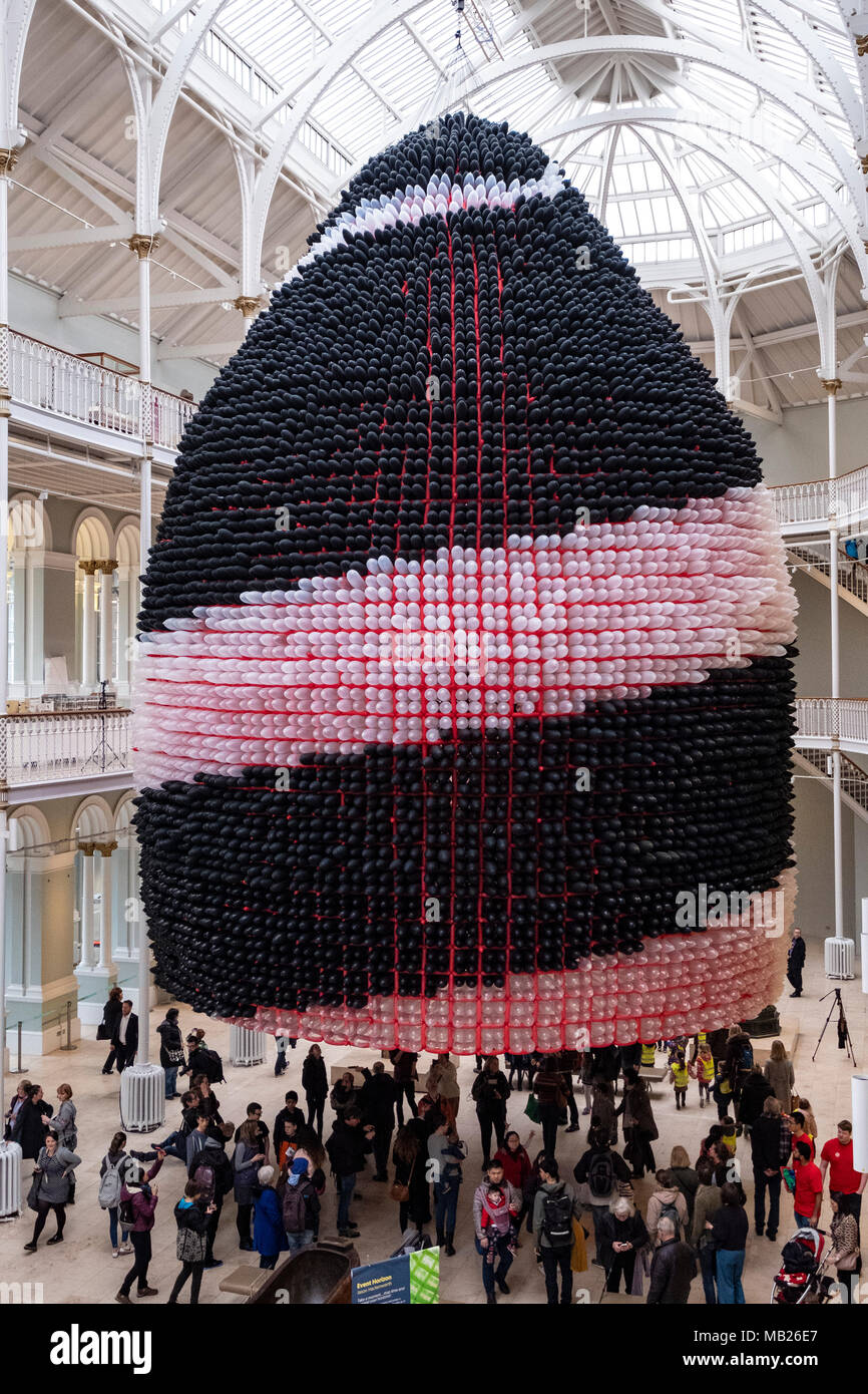 Edinburgh, UK. 6 April, 2018. Event Horizon balloon sculpture unveiled at National Museum of Scotland. American artist Jason Hackenwerth returns to Edinburgh with his biggest creation yet: a 30,000 strong balloon sculpture hanging from the top of the National Museum of Scotland’s Grand Gallery. This will be currently the biggest balloon sculpture in the world. The installation is part of Edinburgh International Science Festival. Credit: Iain Masterton/Alamy Live News Stock Photo