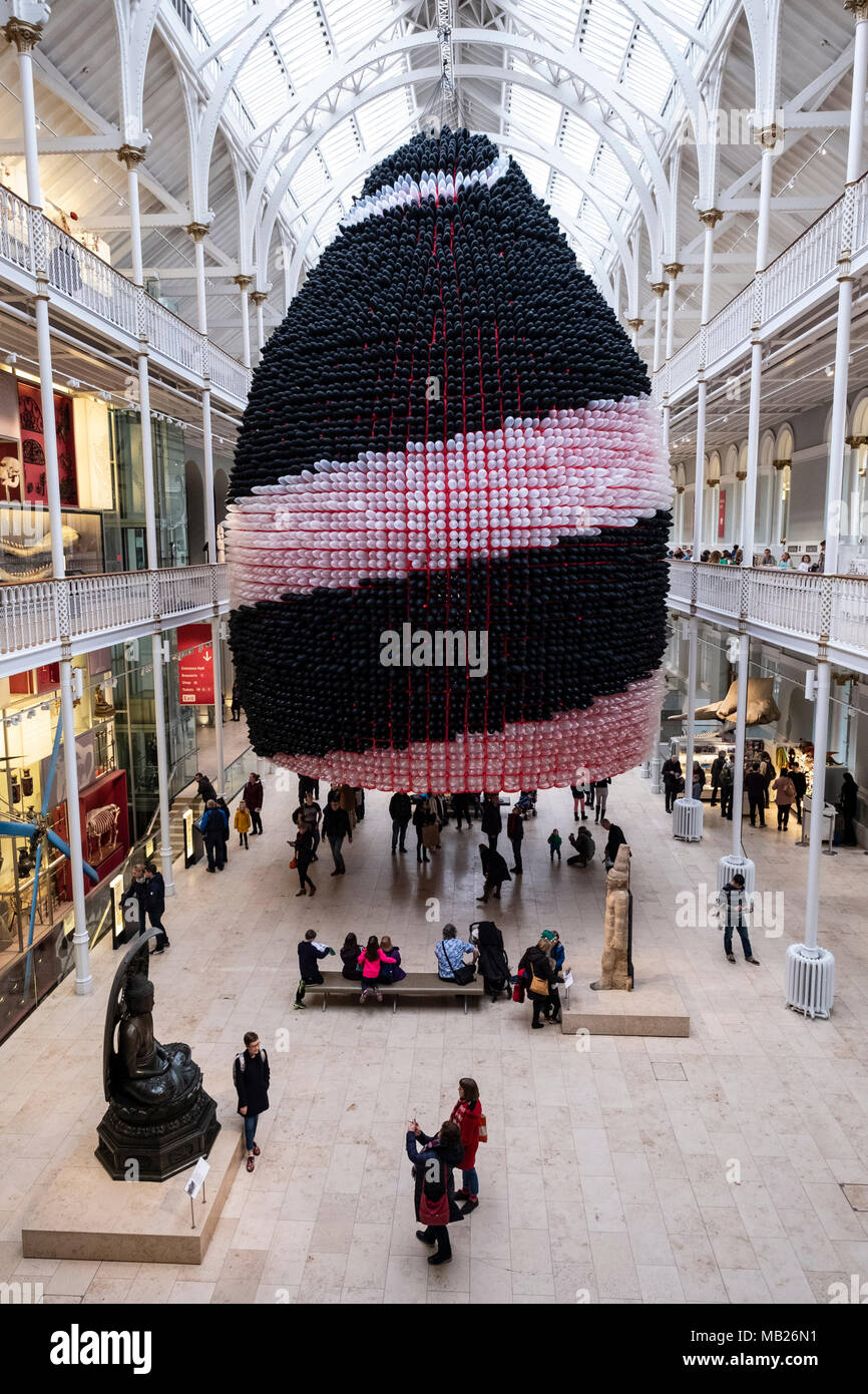 Edinburgh, UK. 6 April, 2018. Event Horizon balloon sculpture unveiled at National Museum of Scotland. American artist Jason Hackenwerth returns to Edinburgh with his biggest creation yet: a 30,000 strong balloon sculpture hanging from the top of the National Museum of Scotland’s Grand Gallery. This will be currently the biggest balloon sculpture in the world. The installation is part of Edinburgh International Science Festival. Credit: Iain Masterton/Alamy Live News Stock Photo