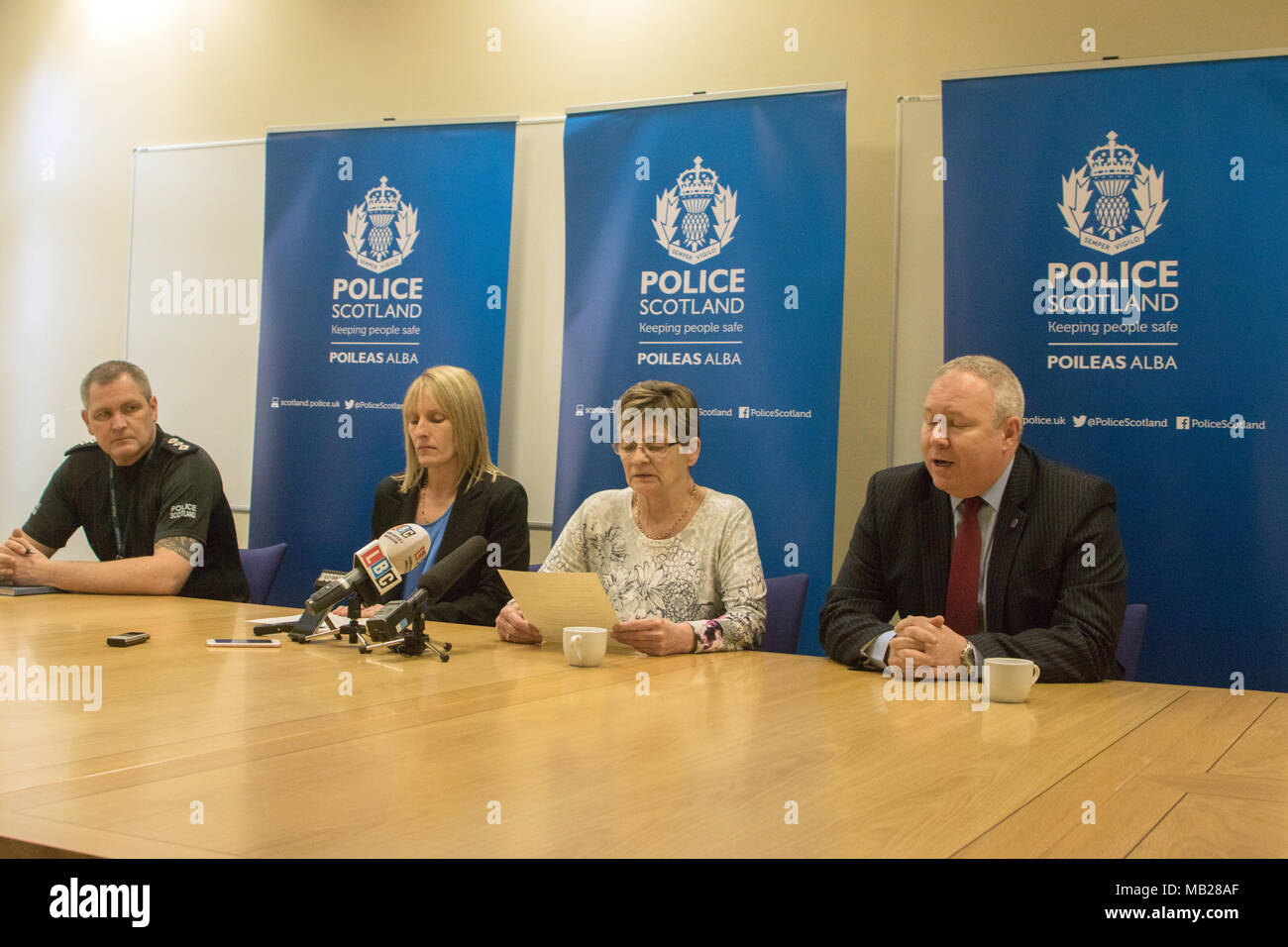 Paisley, UK. 6th April, 2018. Police Scotland has held a press conference in an appeal for information to help find 47-year-old, Julie Reilly, a missing person last seen in Govan, Glasgow, at around 5 pm on Tuesday, 6th February. Detective Chief Inspector Mark Bell and Chief Inspector Alan Bowater provided an overview of the ongoing enquiry. A statement for the family was given by Julie's mother, Margaret Hanlon (69), and Julie's younger sister, Lynne Bryce (36). Credit: Iain McGuinness/Alamy Live News Stock Photo