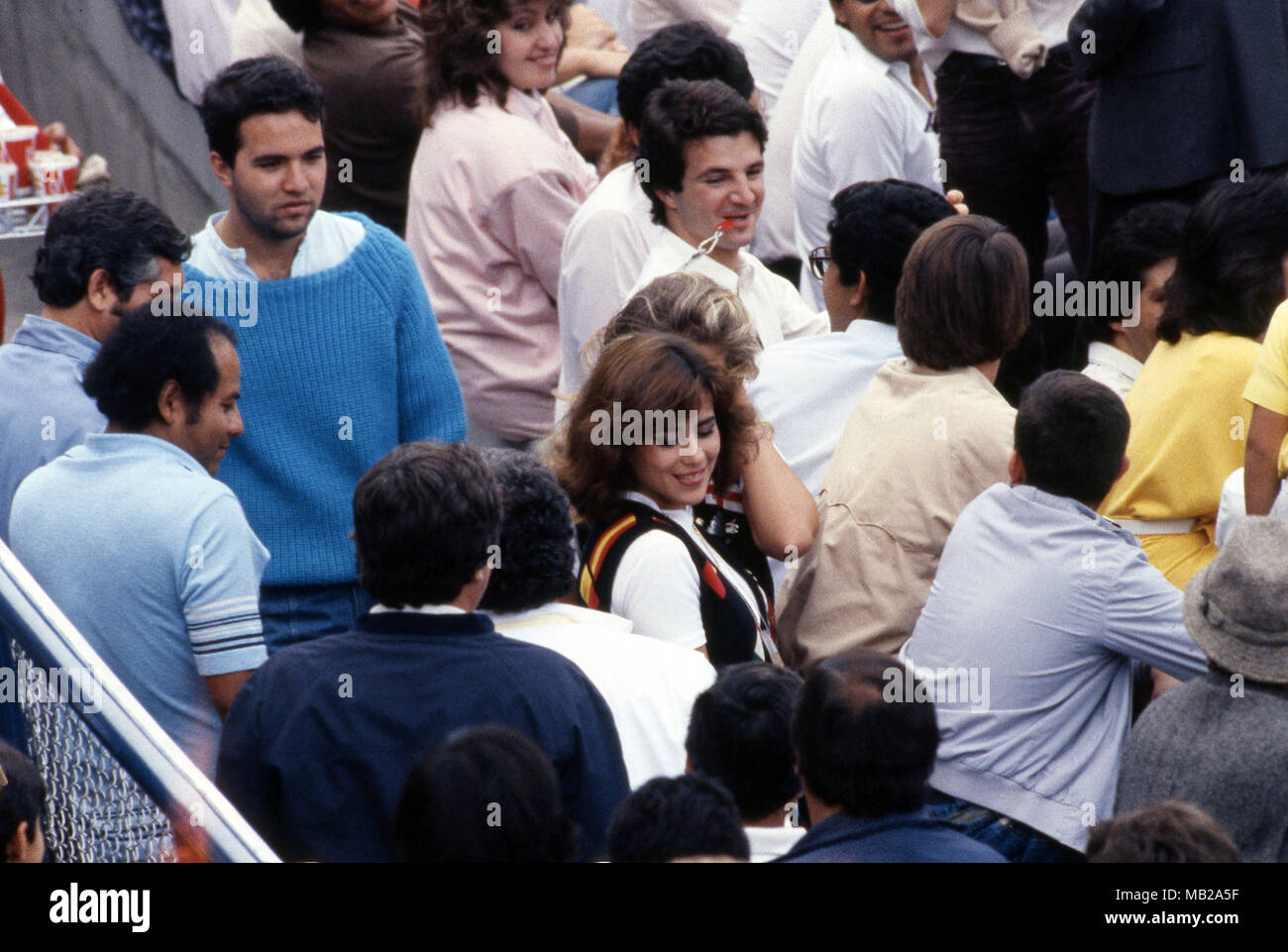 FIFA World Cup - Mexico 1986 22.6.1986, Estadio Azteca, Mexico, D.F. Quarter-final Argentina v England. Female fans receive male attention in the stand. Stock Photo