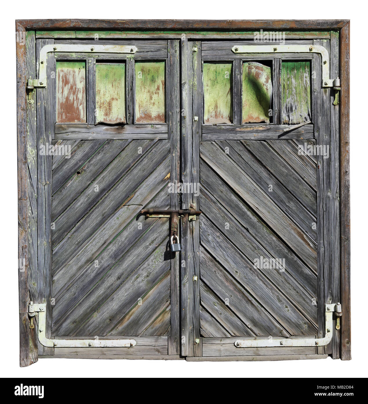 Vintage aged  not painted wooden garage doors with clogged plywood windows. Isolated on white with patch. Sunny day outdoor panoramic collage Stock Photo