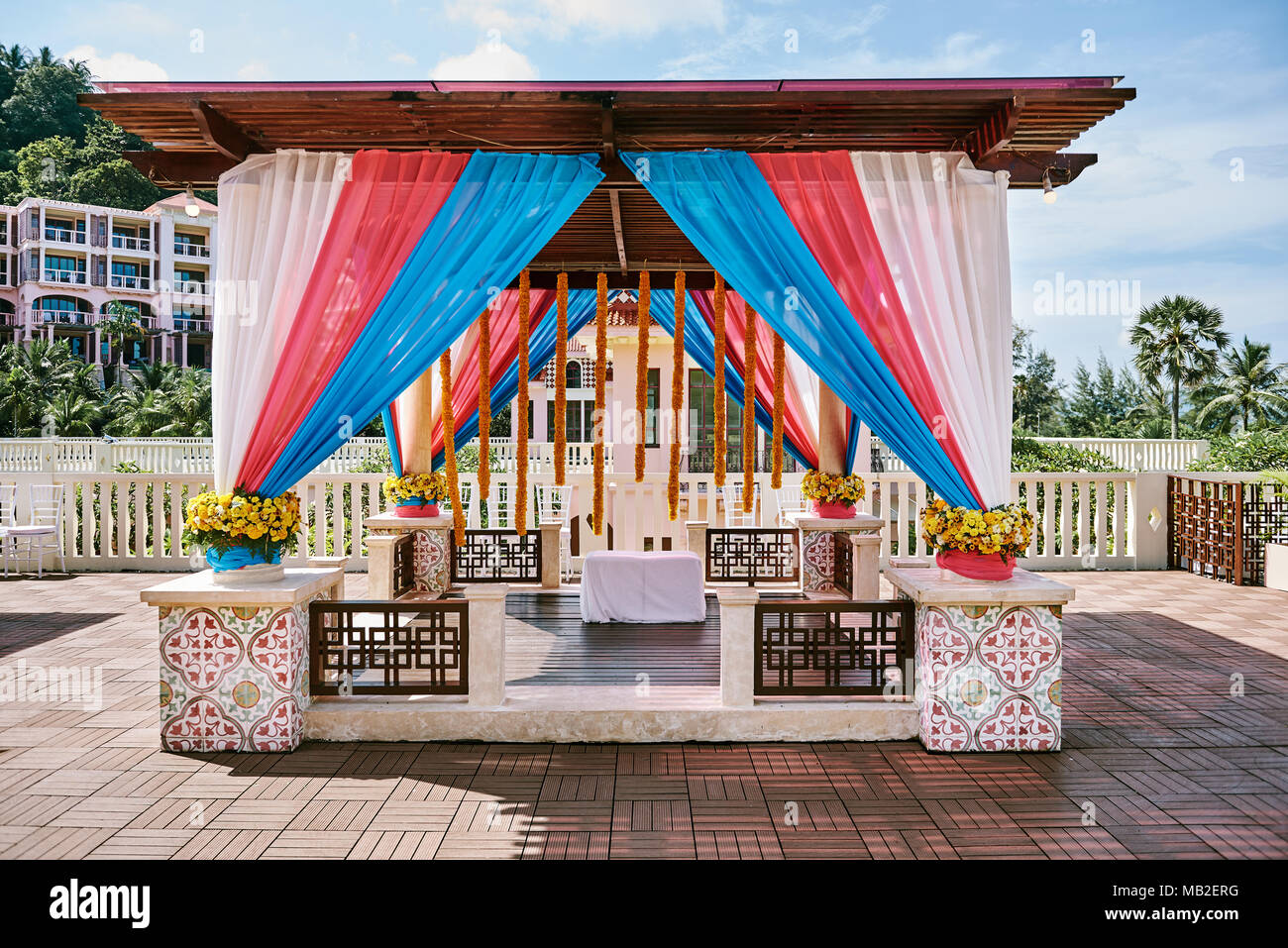 The colourful decoration of indian wedding venue for mehndi (henna), thread  ceremony Stock Photo - Alamy, image size:1300x957