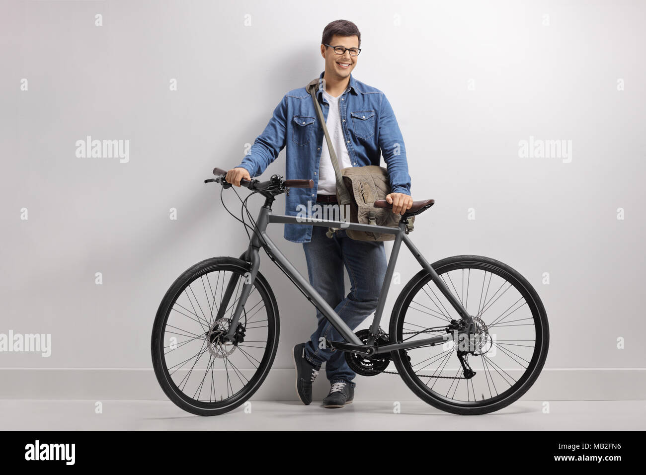 Young Woman Posing With Bicycle Stock Photo - Download Image Now - Cycling,  City, Summer - iStock