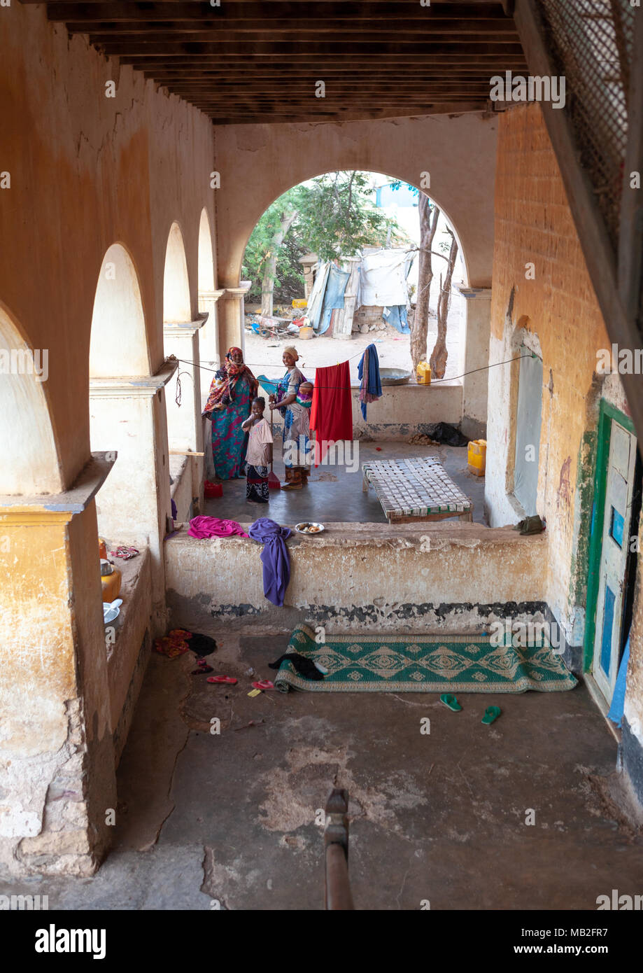 Somali women under the arcades of a former ottoman house, North-Western province, Berbera, Somaliland Stock Photo