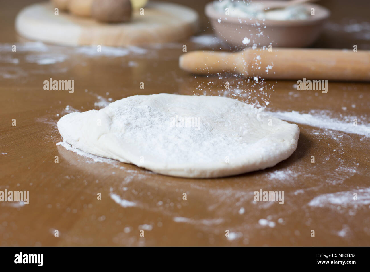 Making of Homemade cheese Pie or other kind of pastry appetizer or sweets on a backing Tray. Stock Photo