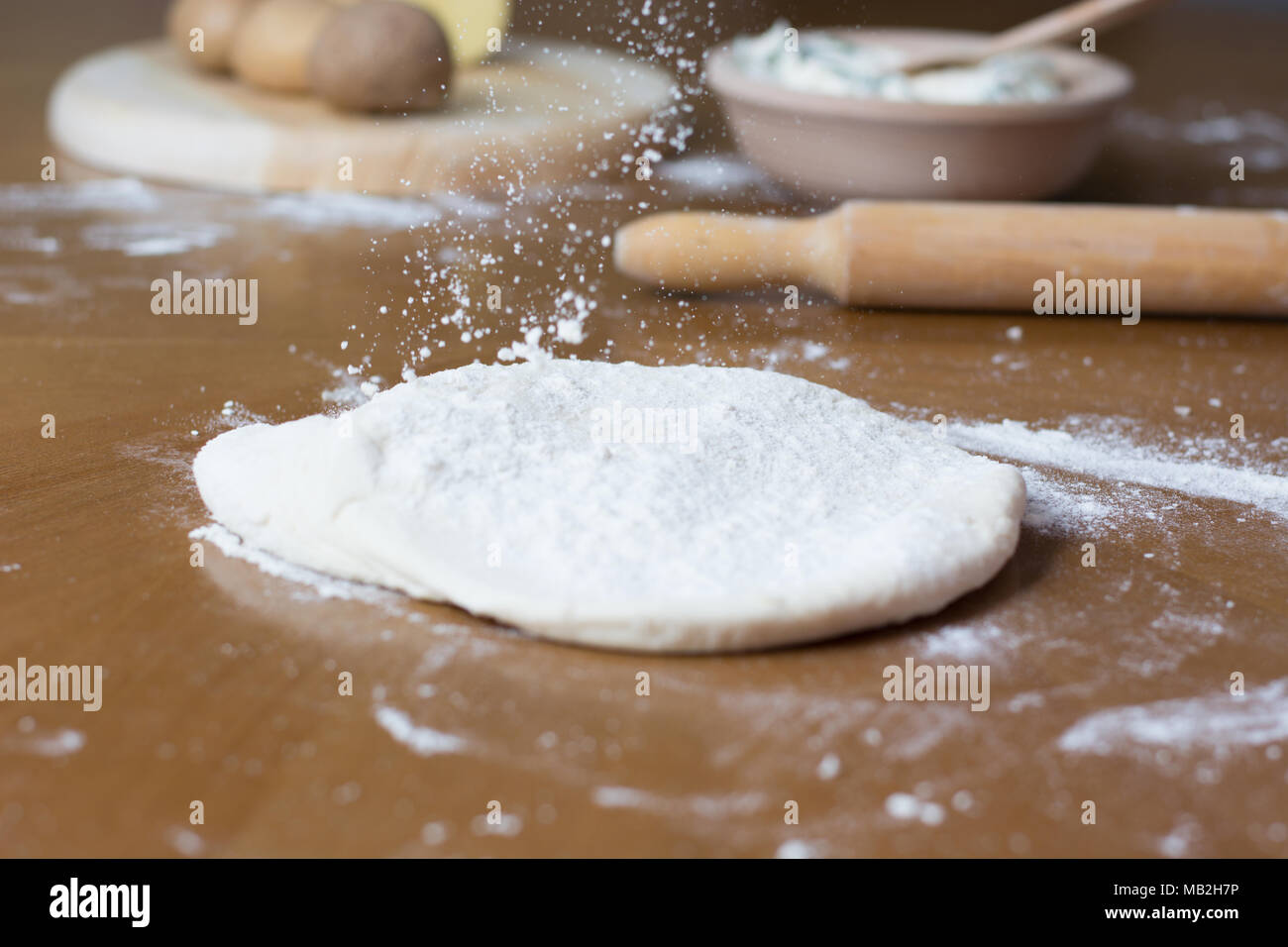 Making of Homemade cheese Pie or other kind of pastry appetizer or sweets on a backing Tray. Stock Photo