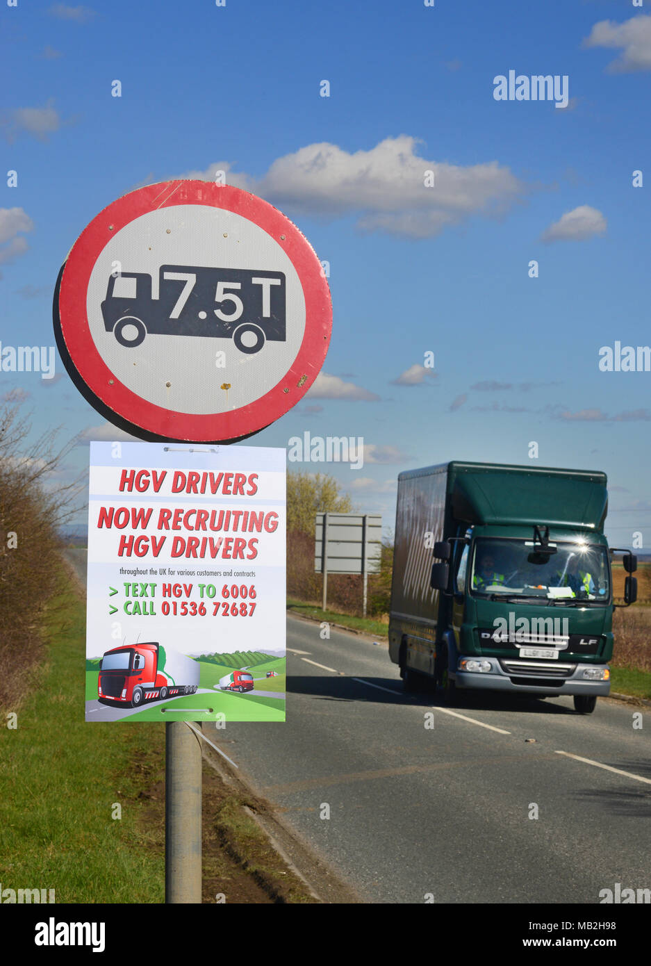 lorry driver passing roadside recruitment advert for hgv lorry drivers leeds united kingdom Stock Photo
