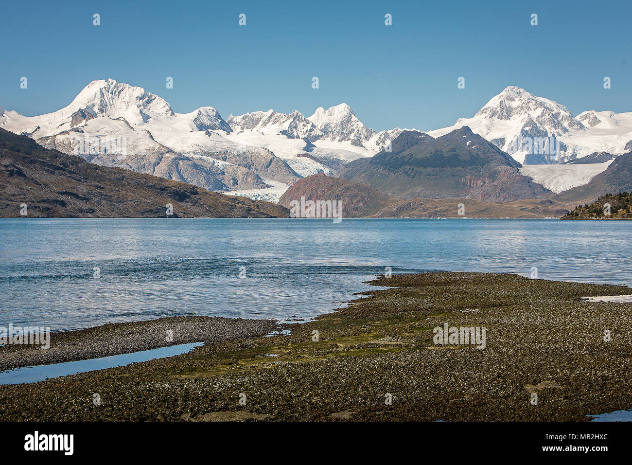 Cordillera Darwin, in Ainsworth Bay, PN Alberto de Agostini, Tierra del Fuego, Patagonia, Chile Stock Photo