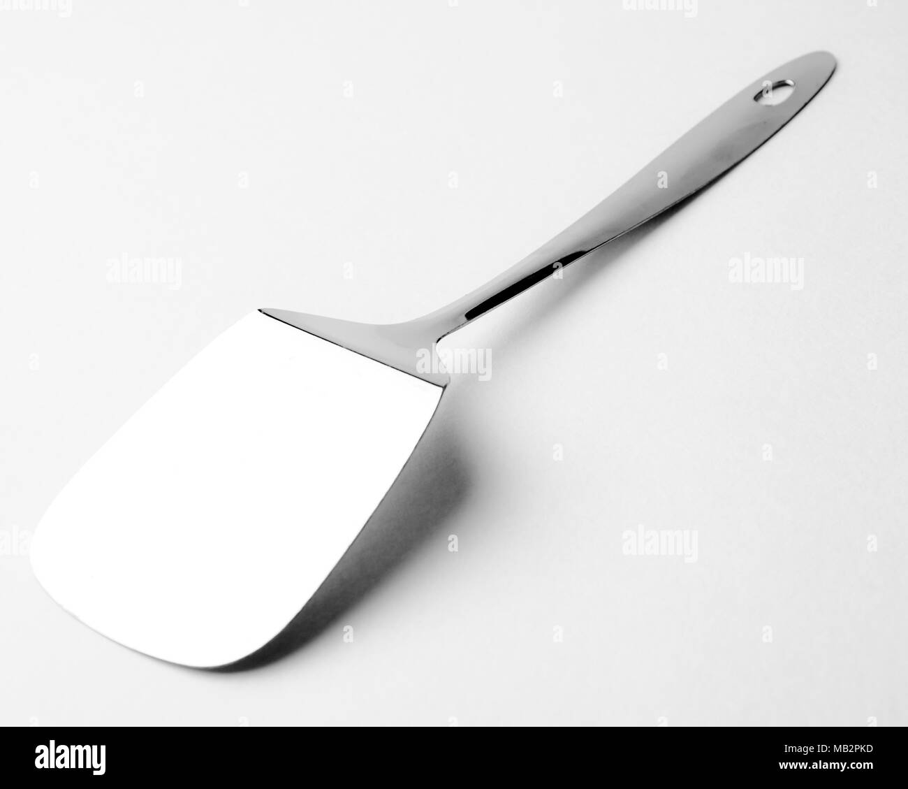 Kitchen Cooking Utensil Spatula Silver utensils used in kitchen Stock Photo