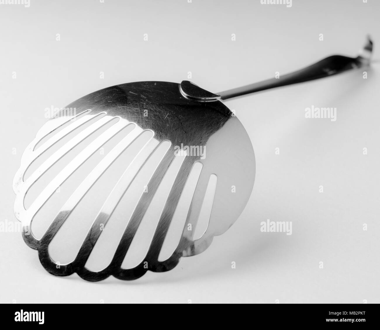 Skimmer fry ladle on isolated white background for kitchen Stock Photo