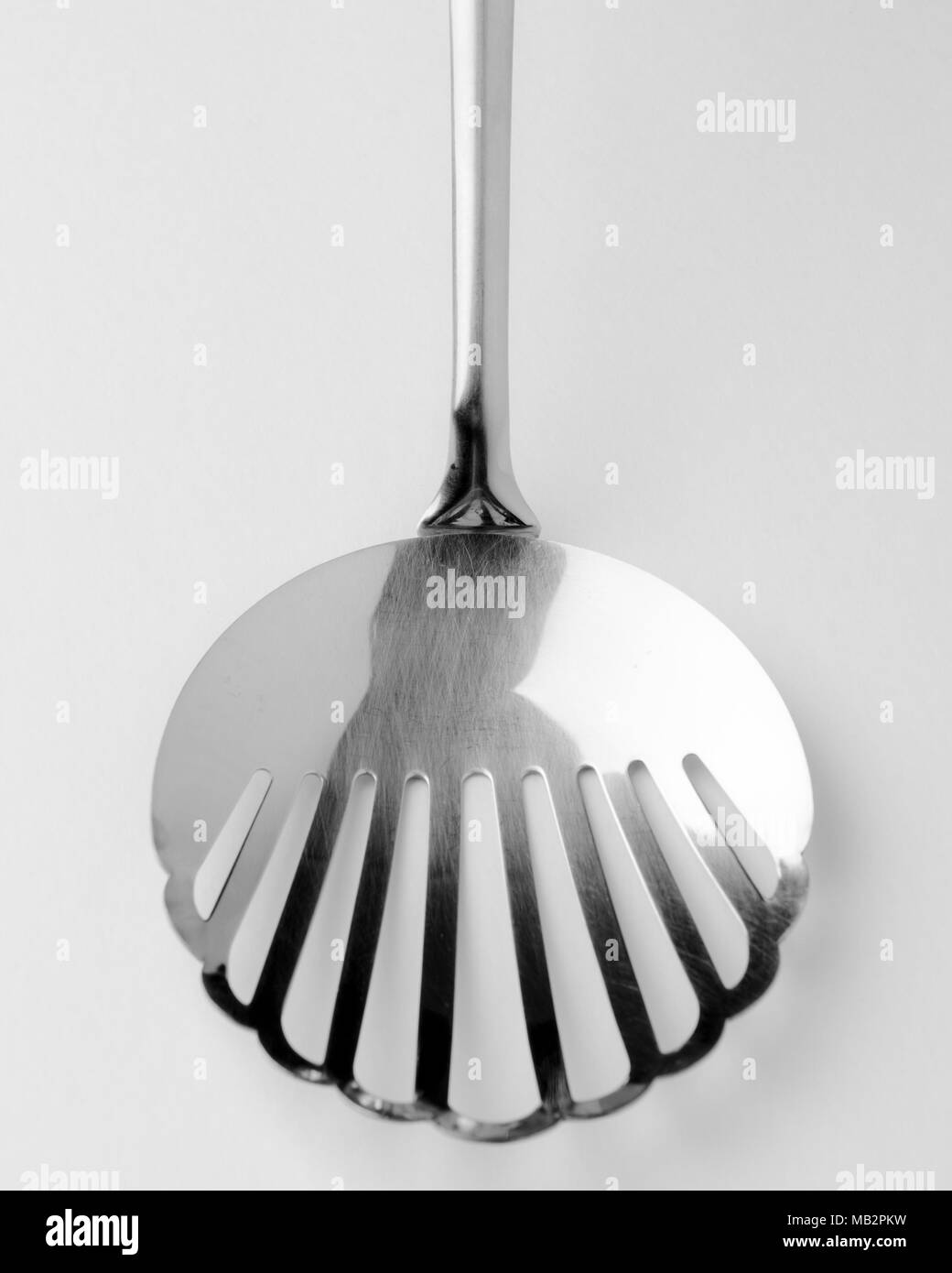 Skimmer fry ladle on isolated white background for kitchen Stock Photo Alamy