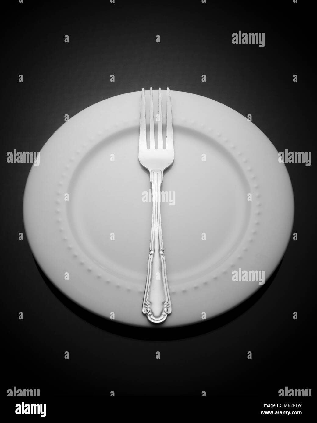 Empty used plate Black and White Stock Photos & Images Alamy