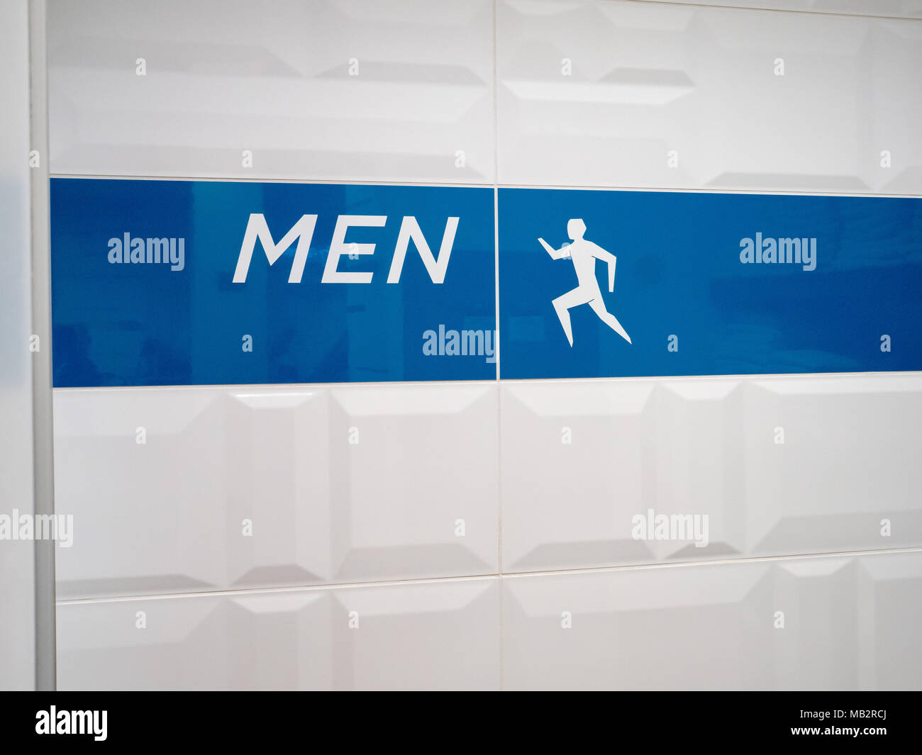 Men's locker room entrance sign in modern office setting Stock Photo