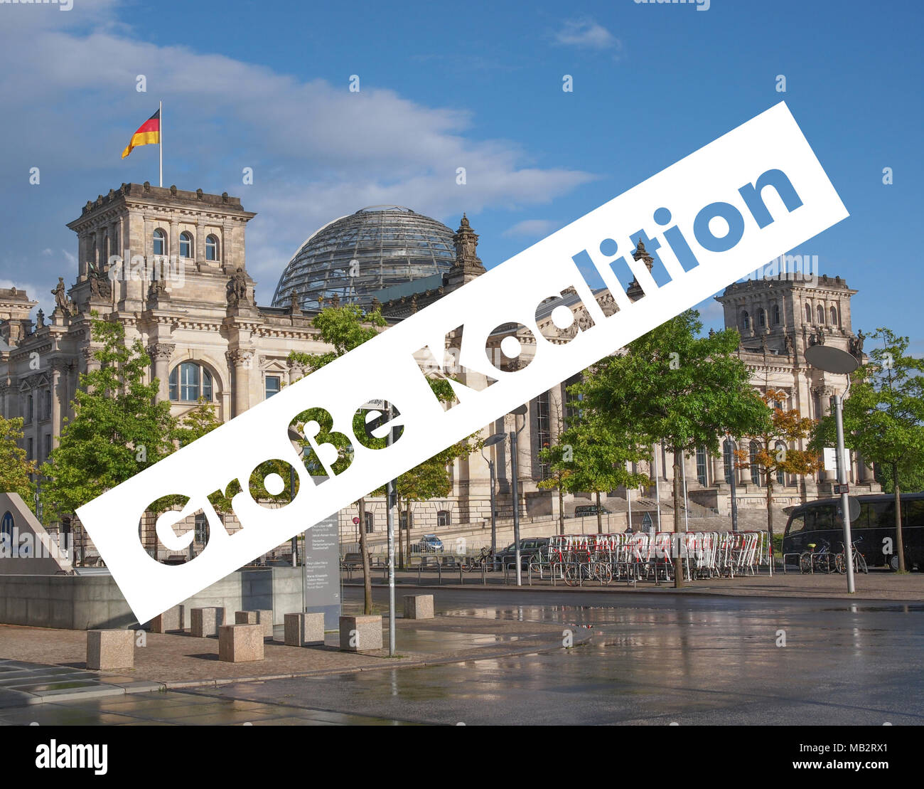 Grosse Koalition (meaning Grand Coalition) superimposed to the Reichstag houses of parliament in Berlin, Germany Stock Photo