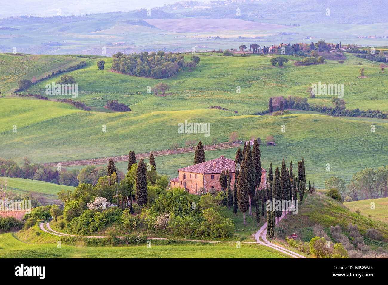 Italian villa on a hill in the rural landscape Stock Photo - Alamy