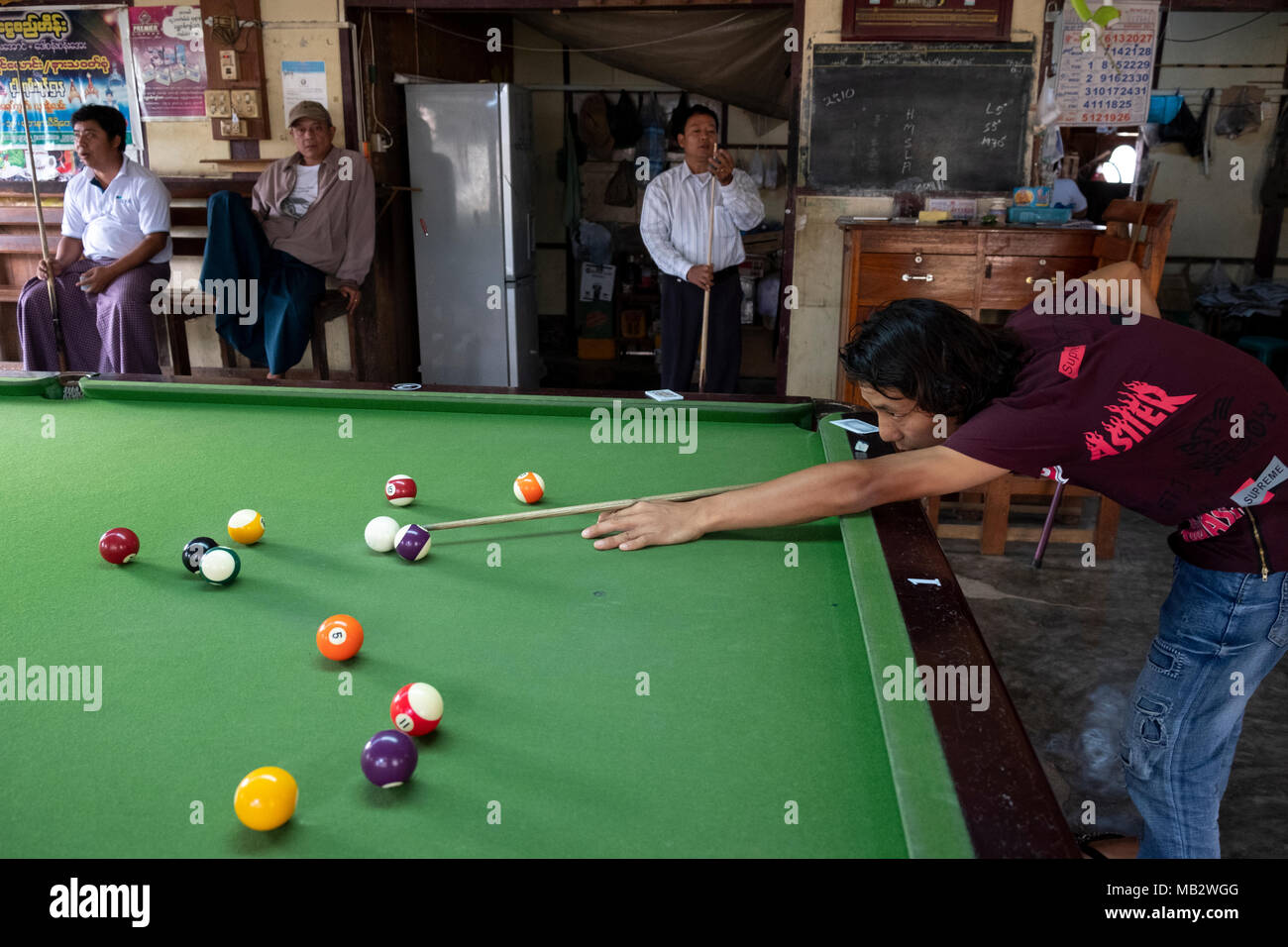 Men at a snooker hall in Loikaw, Kayah State, Myanmar Stock Photo