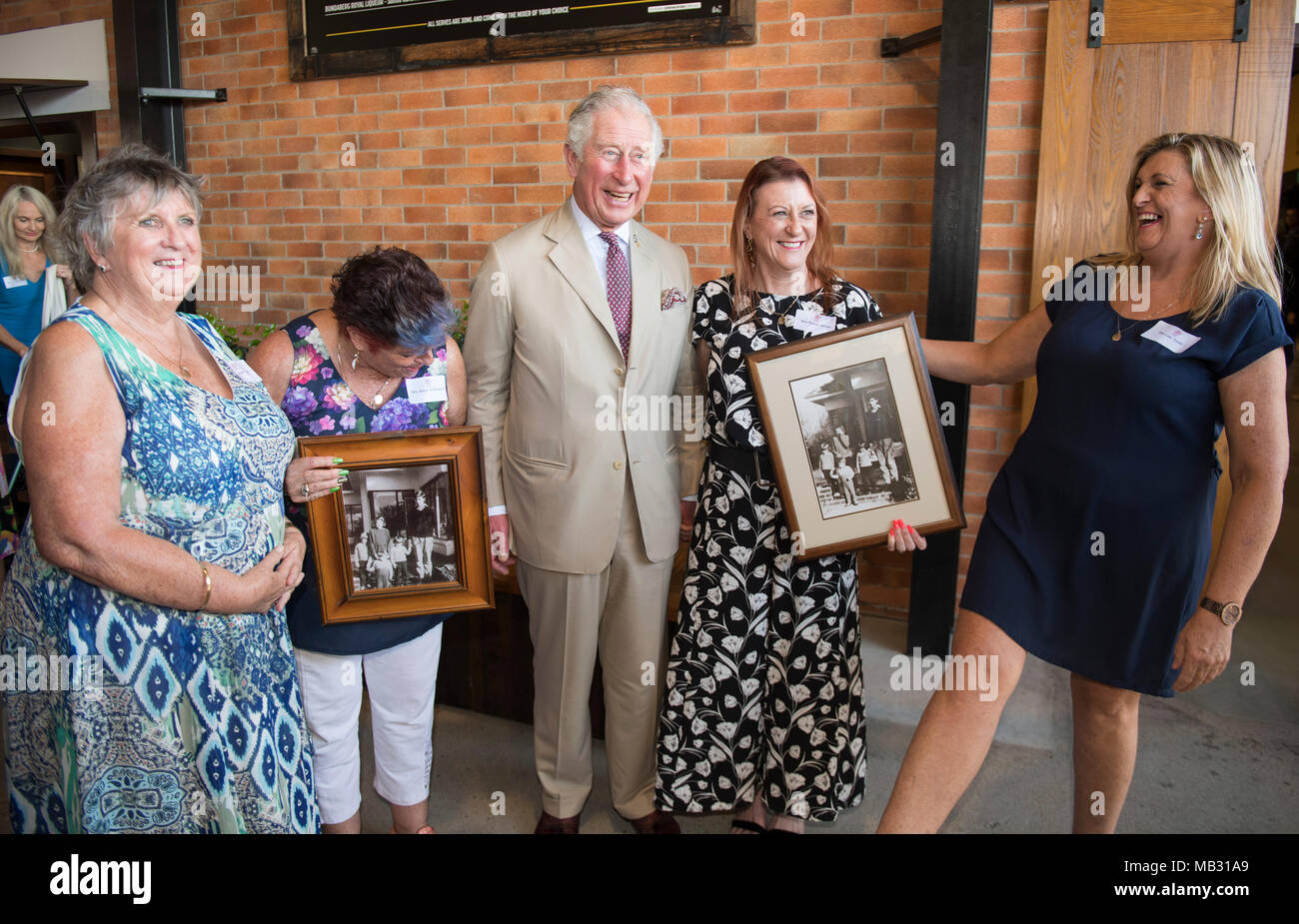 The Prince of Wales meets four sisters he boarded with when he was 17, in Geelong, Victoria where he went to school, (Left to right) Penny Jenner, Jane Tozer, Amanda Boxhall and Lisa Lawlor during a tour of the Bundaberg Rum Distillery. Stock Photo