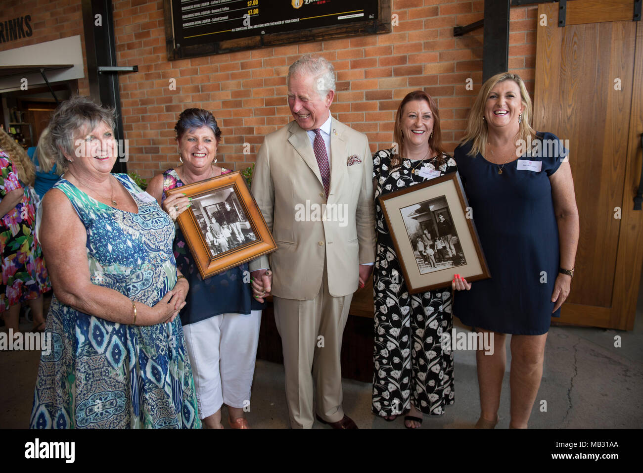 The Prince of Wales meets four sisters he boarded with when he was 17, in Geelong, Victoria where he went to school, (Left to right) Penny Jenner, Jane Tozer, Amanda Boxhall and Lisa Lawlor during a tour of the Bundaberg Rum Distillery. Stock Photo
