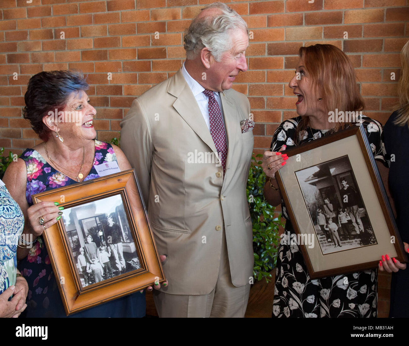 The Prince of Wales meets sisters he boarded with when he was 17, in Geelong, Victoria where he went to school, (Left to right) Jane Tozer and Amanda Boxhall during a tour of the Bundaberg Rum Distillery. Stock Photo