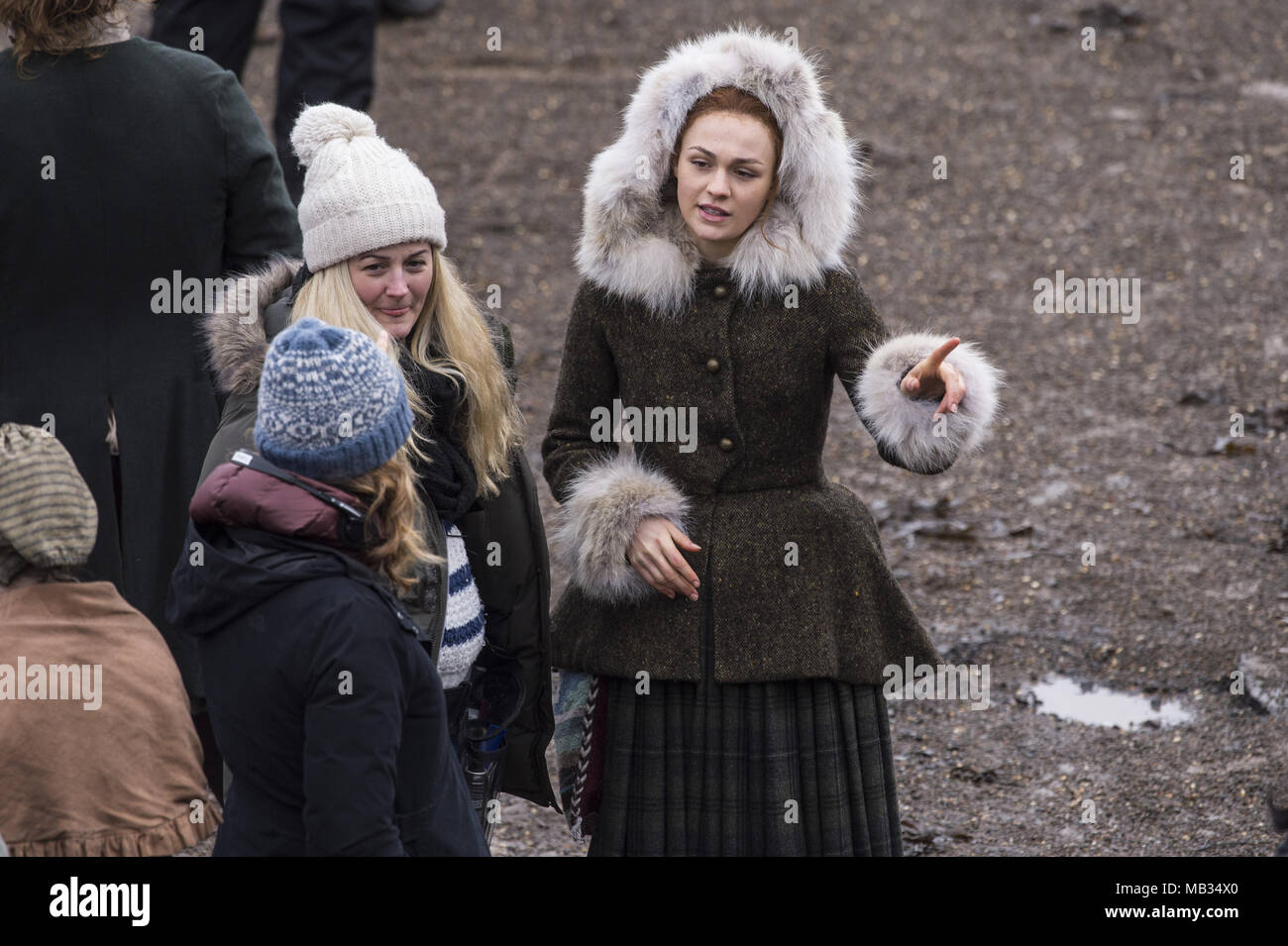 Outlander film crew and actors are spotted filming at a harbour in