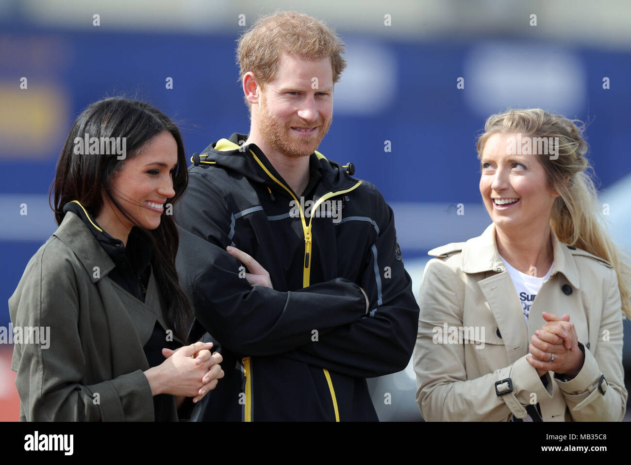 Prince Harry, Meghan Markle and Jayne Kavanagh (right), Chef De Mission for the UK Invictus team at the University of Bath Sports Training Village, Bath, for the UK team trials for the Invictus Games Sydney 2018. Stock Photo