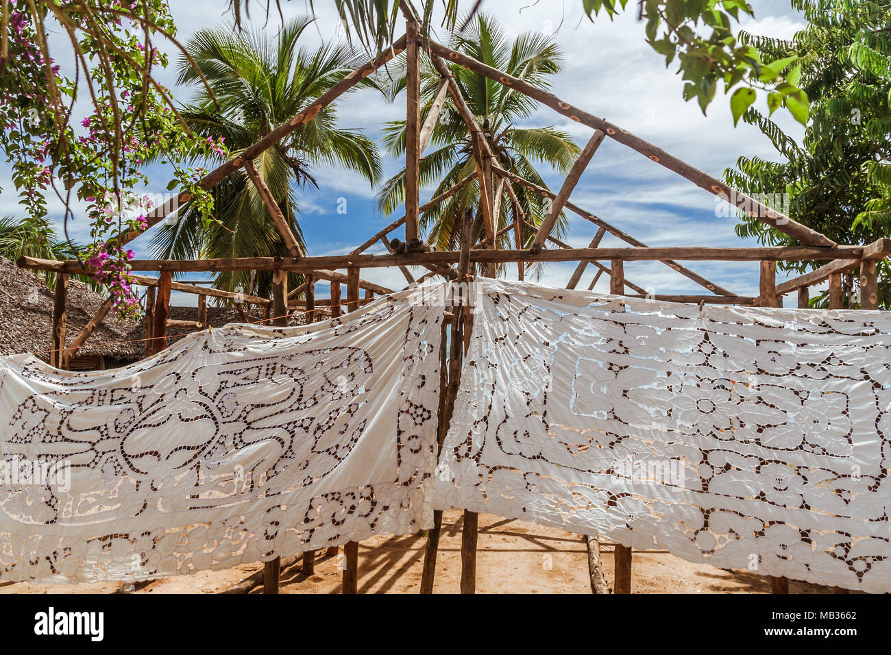 Selling embroidered tablecloths in Nosy Komba (Nosy Be), Madagascar Stock Photo