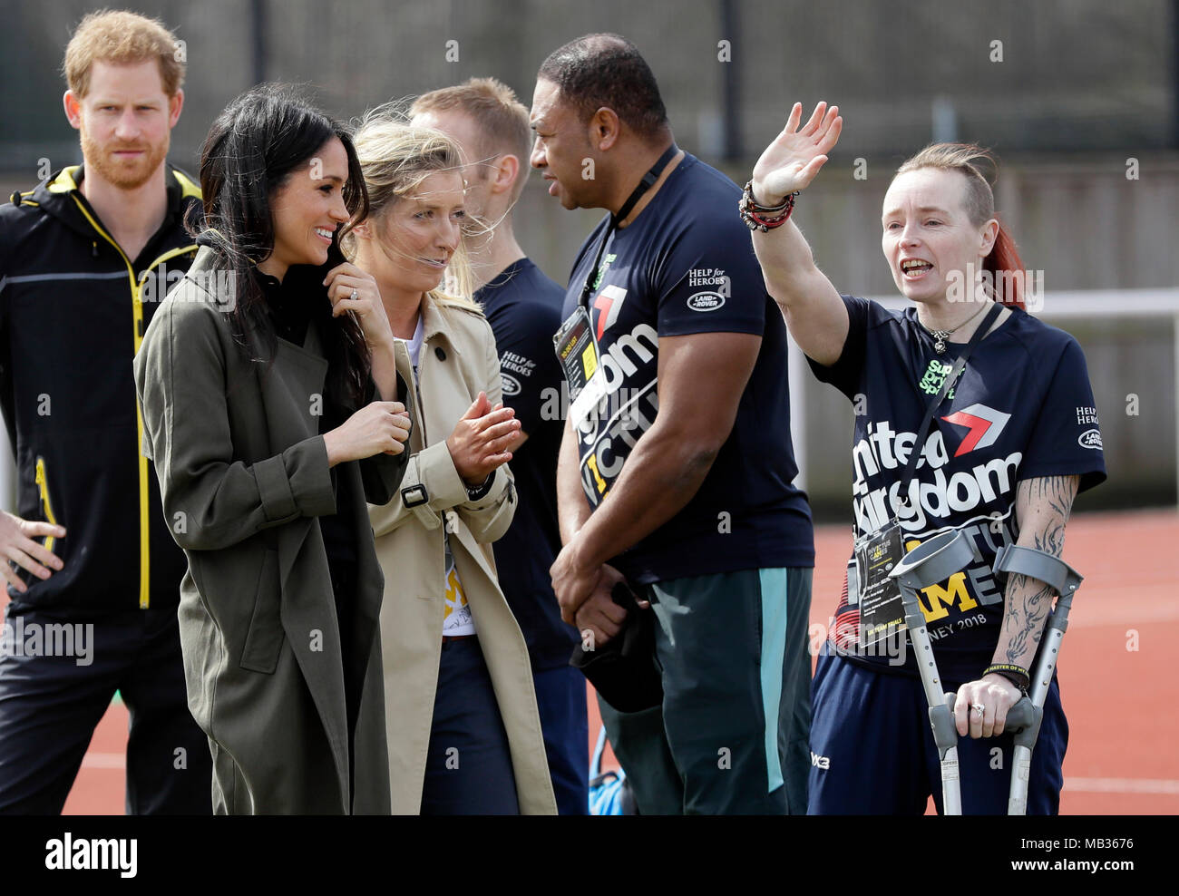 Prince Harry (left), Meghan Markle and Jayne Kavanagh (centre), Chef De Mission for the UK Invictus team meet athletes at the University of Bath Sports Training Village, Bath for the UK team trials for the Invictus Games Sydney 2018. Stock Photo