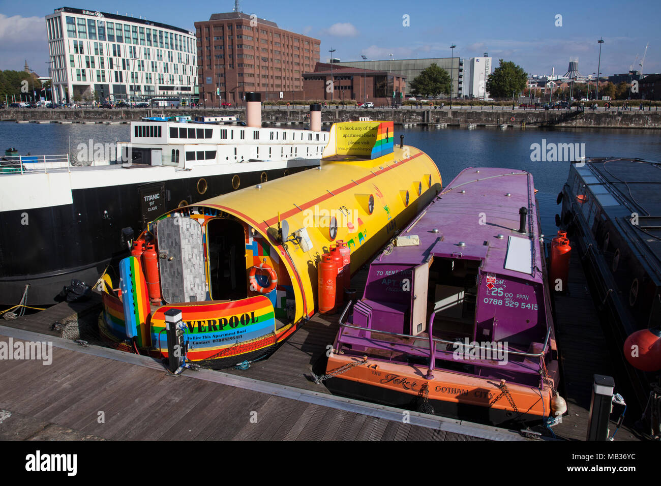 The Yellow Submarine is a Beatles and 1960's themed houseboat used for holiday accommodation at Liverpool Albert Dock, Merseyside, U.K. Stock Photo