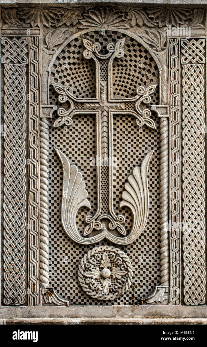 Cross Cast Example the Catholic cross is cast in stone. Close up Stock Photo - Alamy
