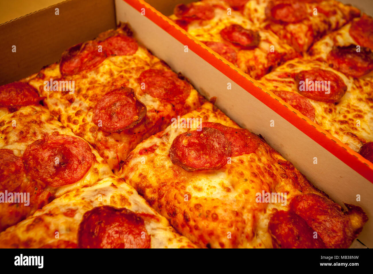 Pepperoni slices of Detroit style deep dish pizza, part of the Lunch