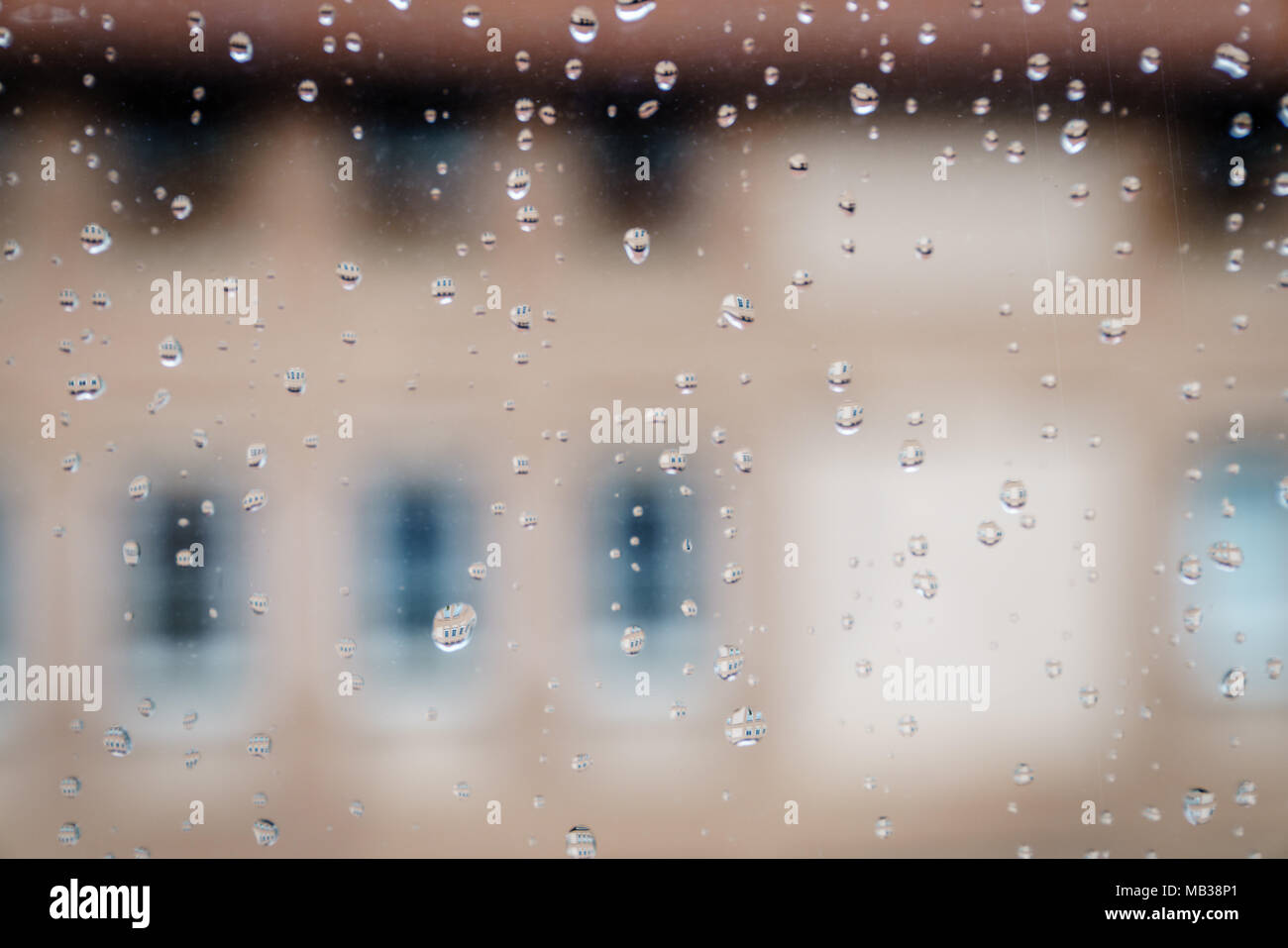 Close-up image of droplets of rain on the window glass Stock Photo