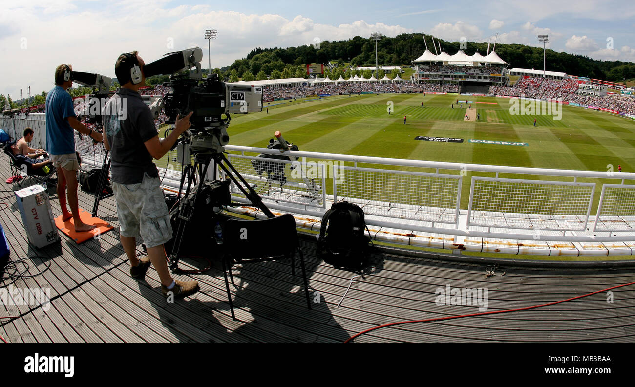 Outside broadcast TV camera operators working at a cricket match at the Rose Bowl on a summers day in 2008. Stock Photo