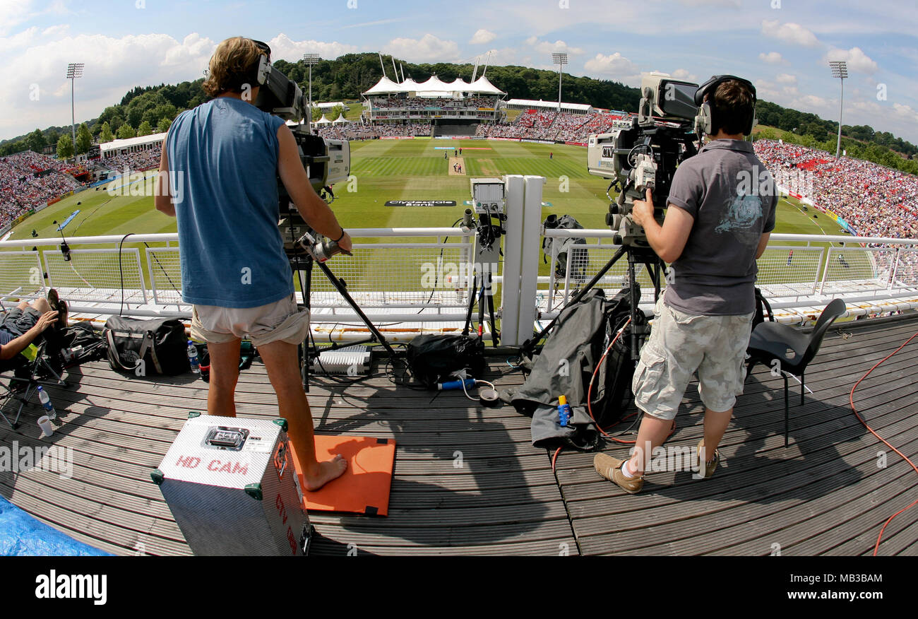 Outside broadcast TV camera operators working at a cricket match at the Rose Bowl on a summers day in 2008. Stock Photo