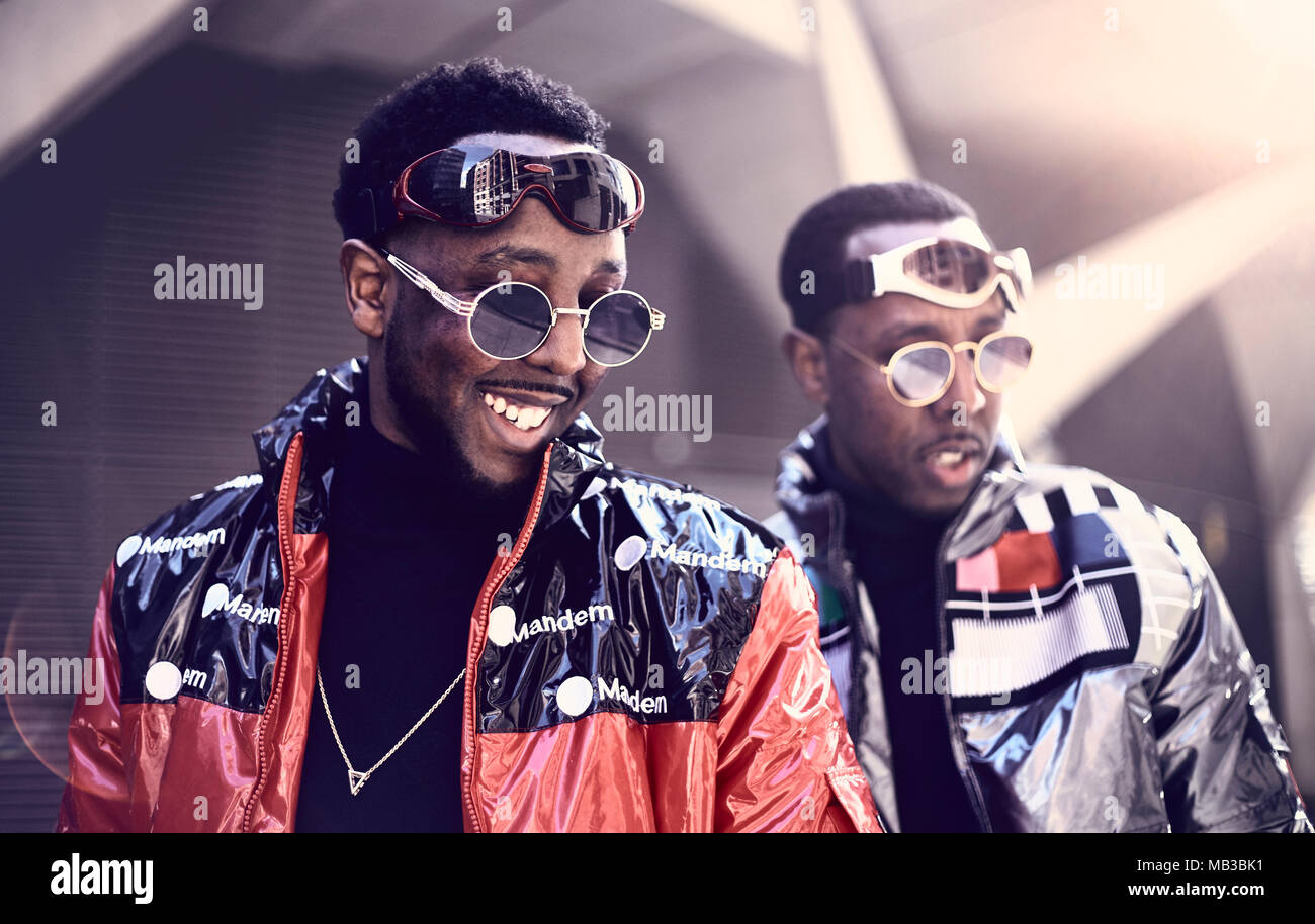 Twin brothers Paul (left) and Peter Allimadi wearing jackets by L4L Clothing as they attend London Fashion Week Autumn Winter 2018. Stock Photo