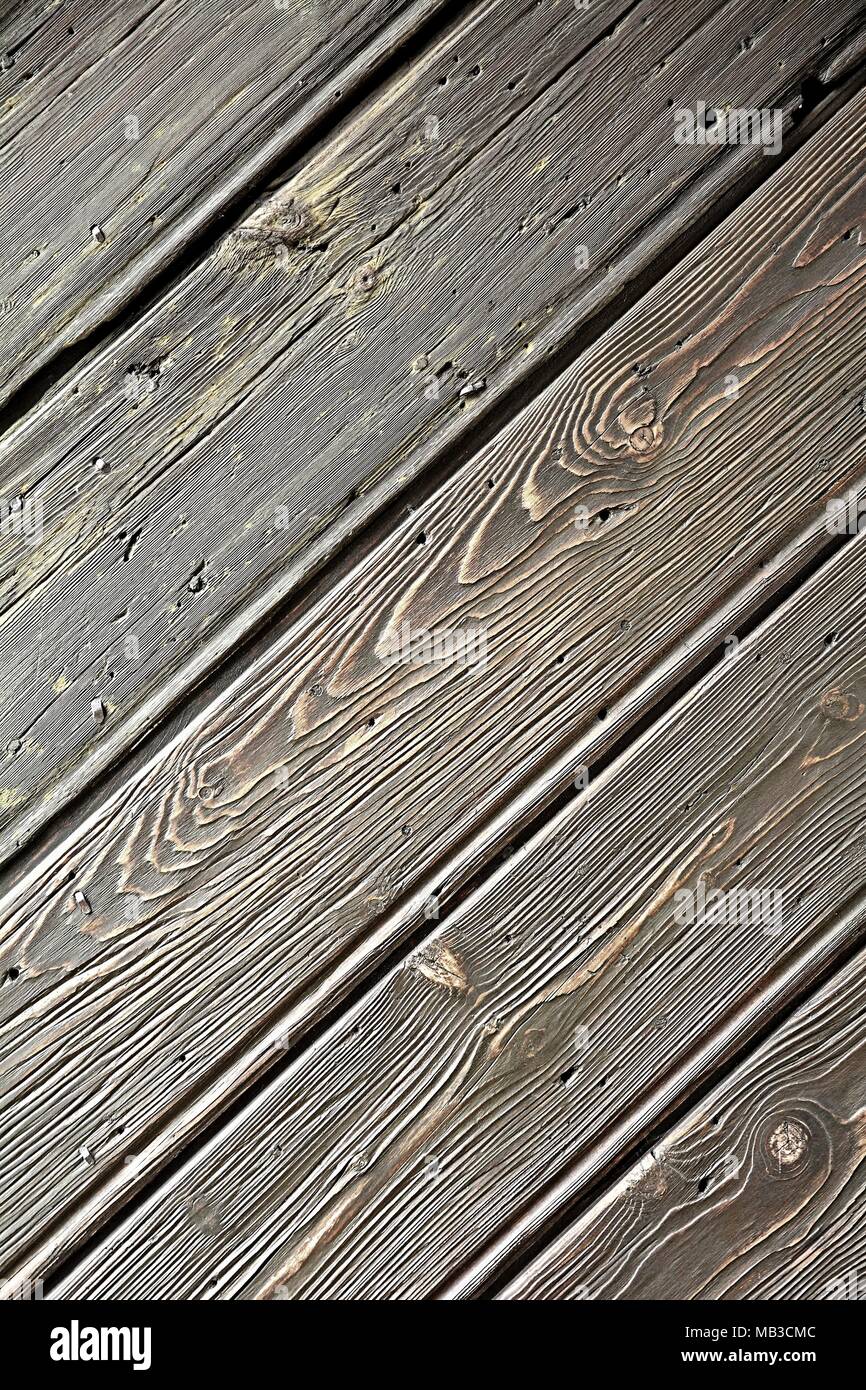 Texture of an Old Brown Wood Surface with Oblique Grainy Natural Pattern. Stock Photo