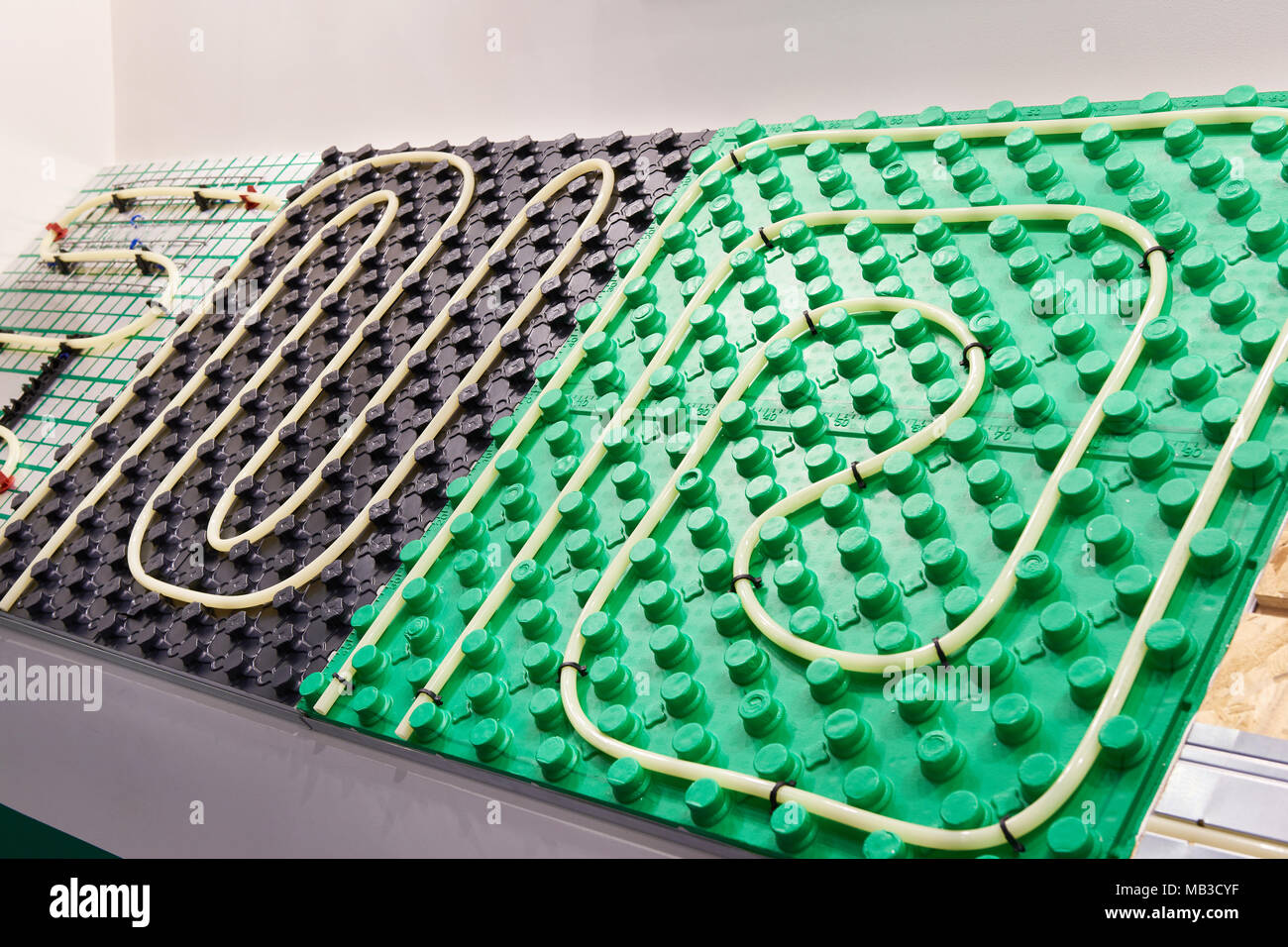 Plastic base for underfloor heating in showcase exhibition Stock Photo