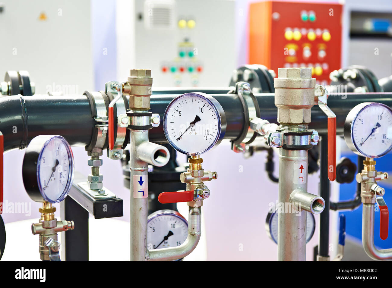 Industrial equipment with pipes and manometers Stock Photo