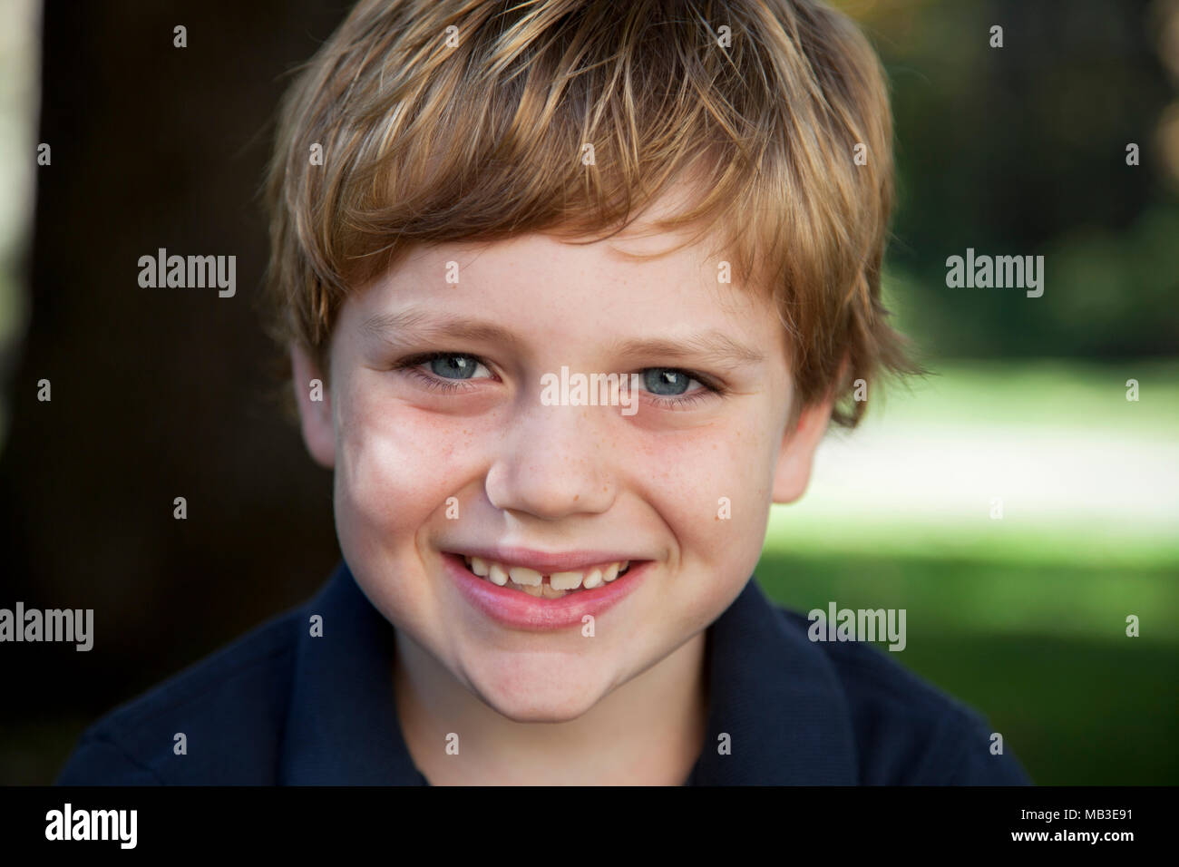 Blonde Boy with Glasses Smiling - wide 9