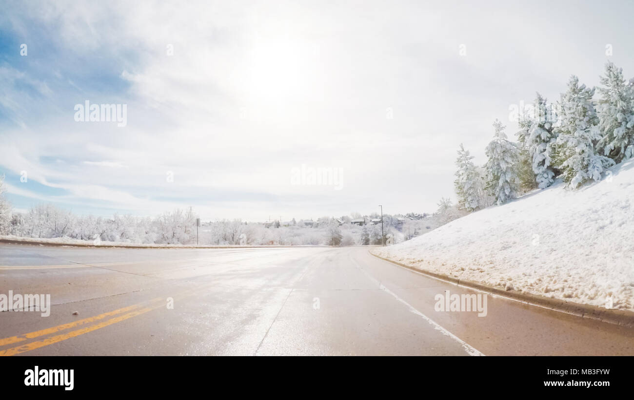 Driving on suburban road after the Sping snow storm Stock Photo - Alamy