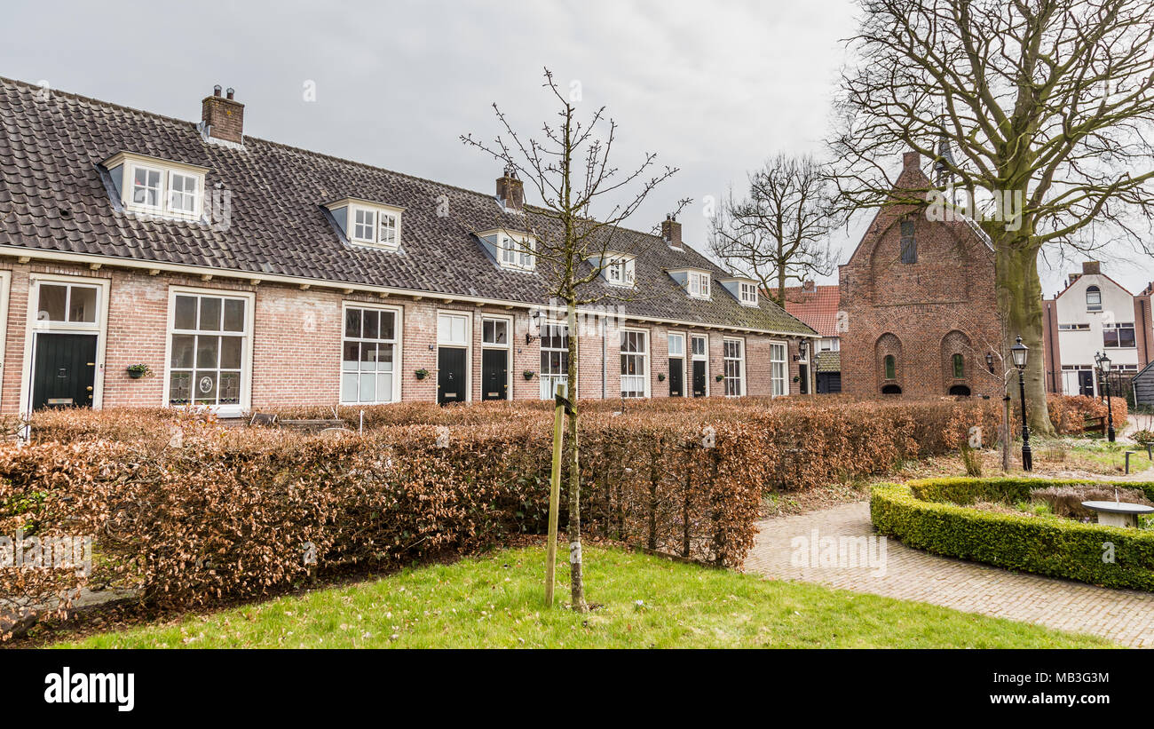 Small tradiitional houses De armen de Poth in the ancient city center of Amersfoort Netherlands