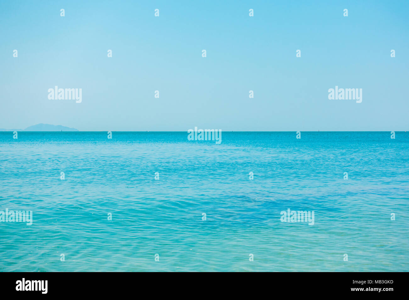 Calm Sea Ocean And Blue Clear Sky Background Stock Photo - Alamy