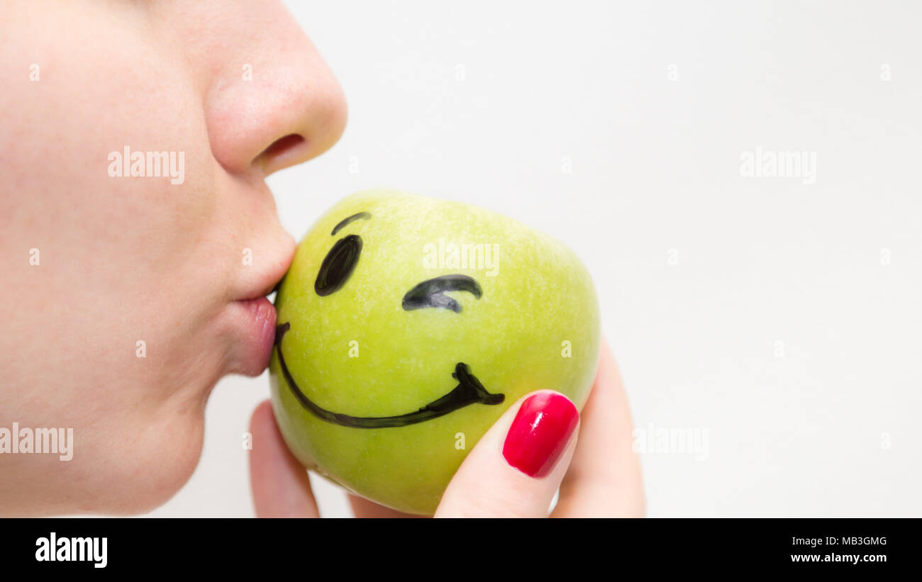 Girl Loving Healthy Food Kissing A Green Aplle With A Smile Stock Photo Alamy