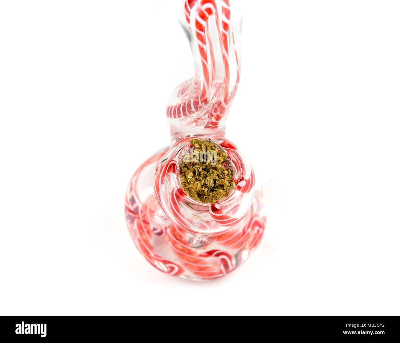 Close up of medical marijuana bud with a glass pipe Stock Photo