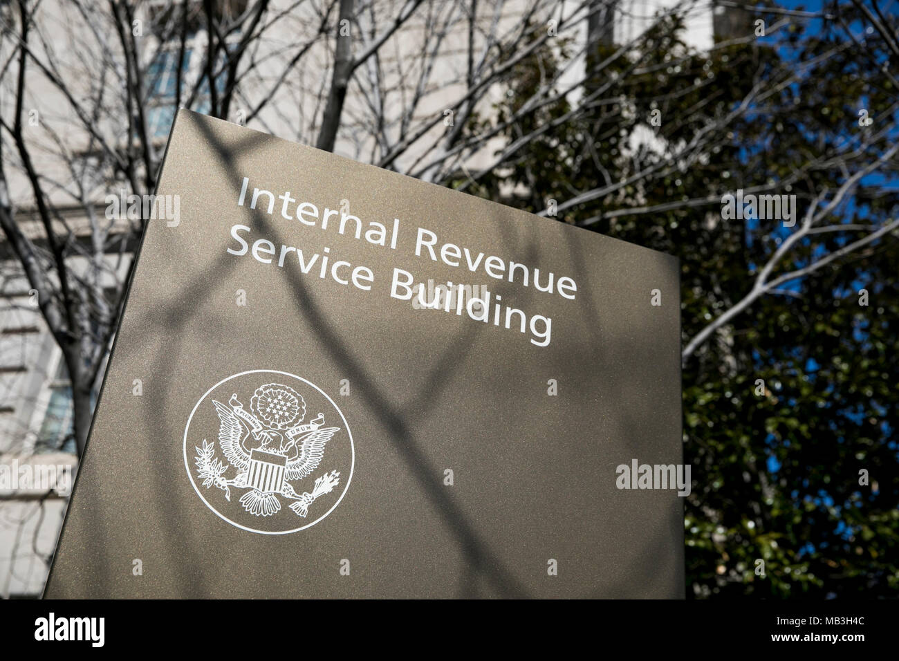 A logo sign outside of the headquarters of the Internal Revenue Service (IRS) in downtown Washington, D.C., on March 31, 2018. Stock Photo