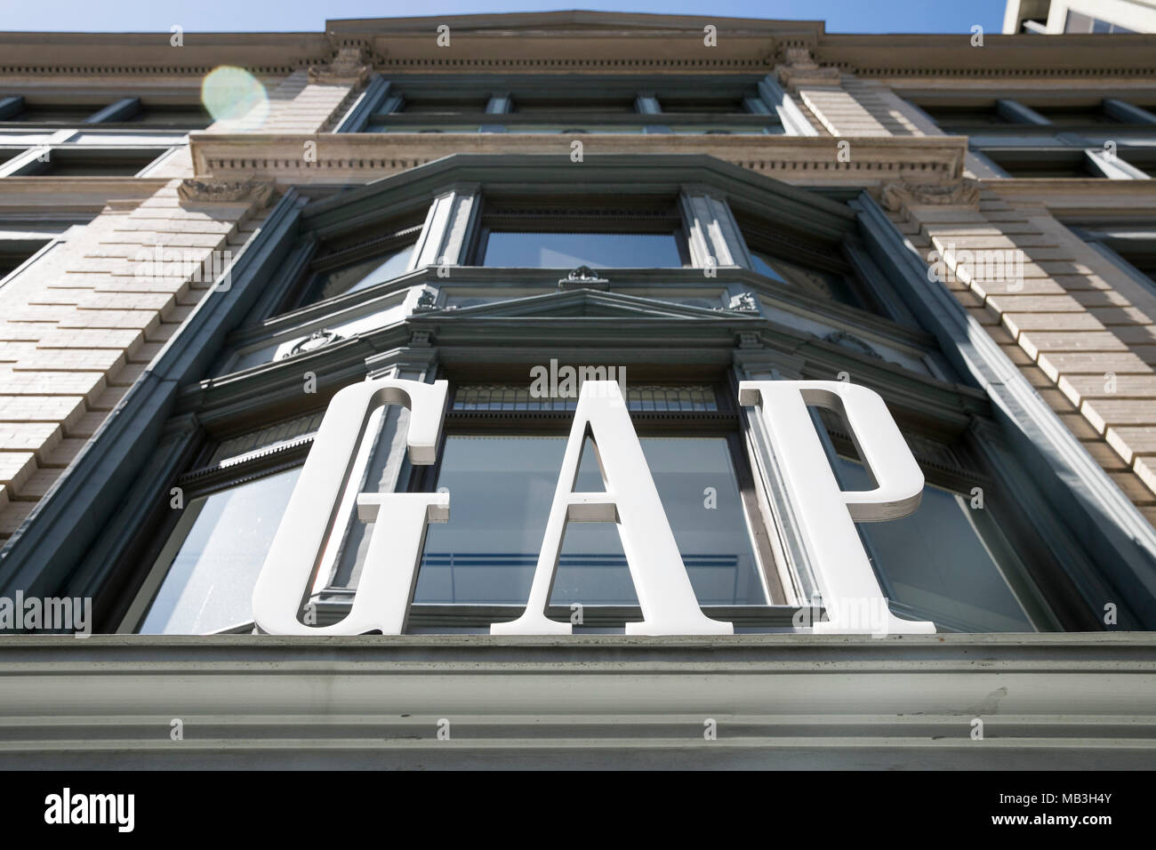 A logo sign outside of a Gap retail store in downtown Washington, D.C., on March 31, 2018. Stock Photo