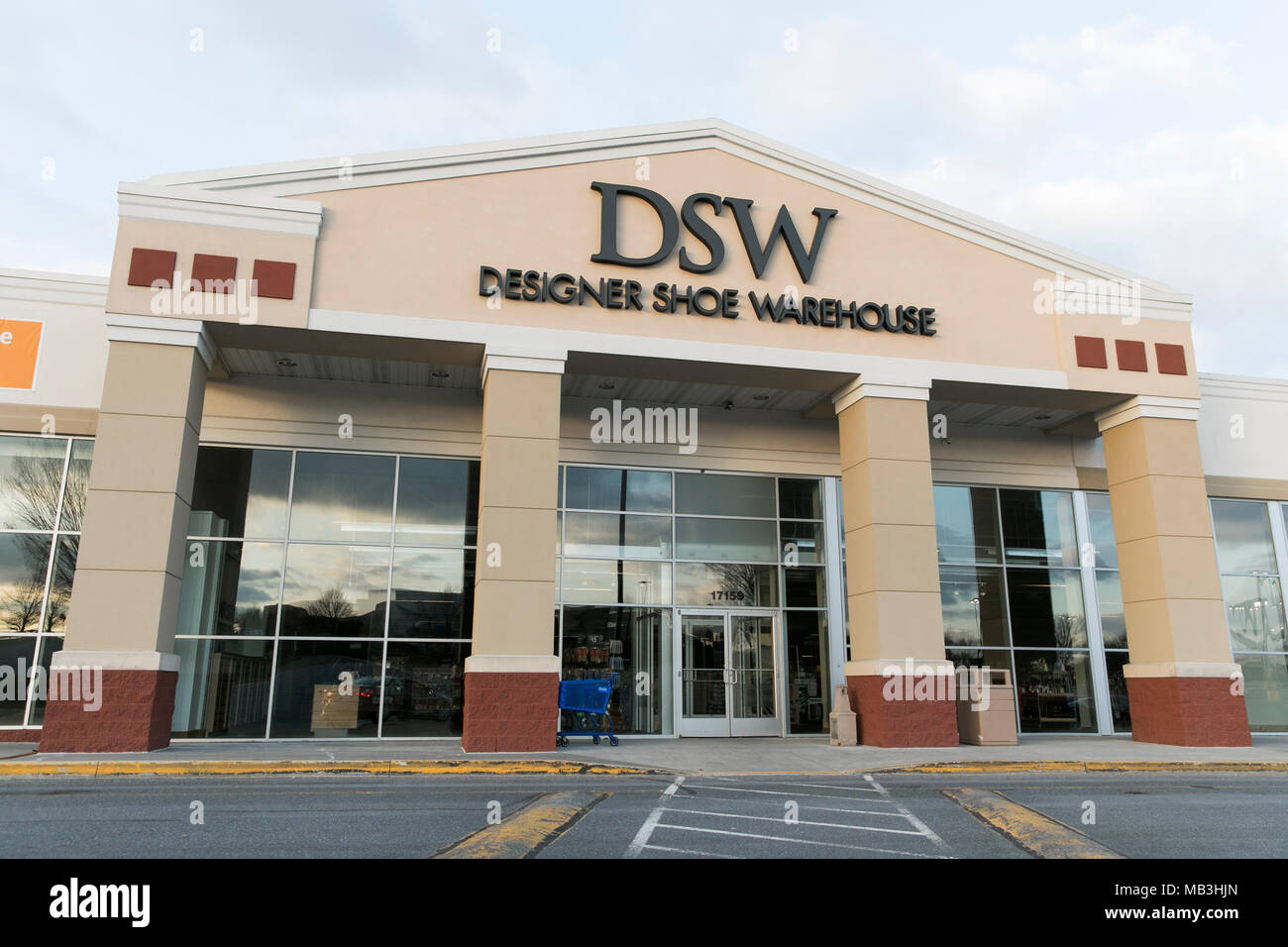 A DSW (Designer Shoe Warehouse) logo seen on a retail store front in Hagerstown, Maryland on April 5, 2018. Stock Photo